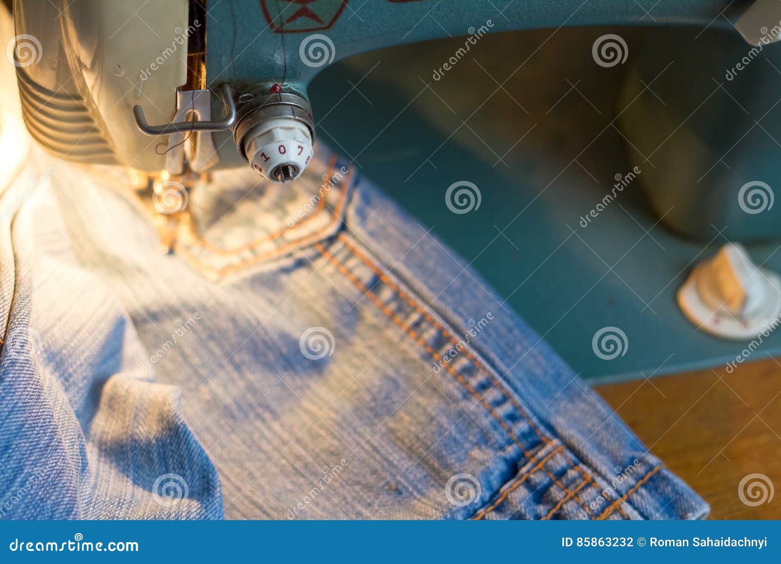 Sewing jeans. stock photo. Image of sewing, repair, closeup 85863232