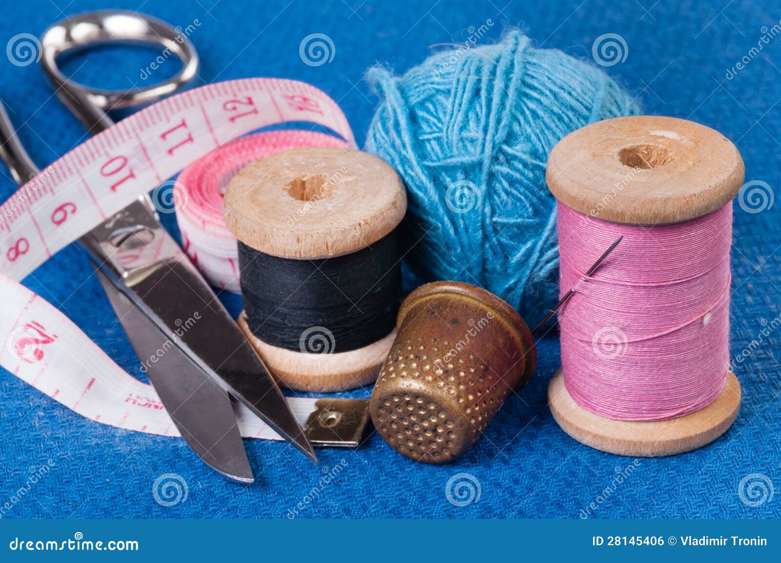 Sewing Kit on blue fabric stock photo. Image of tools 28145406