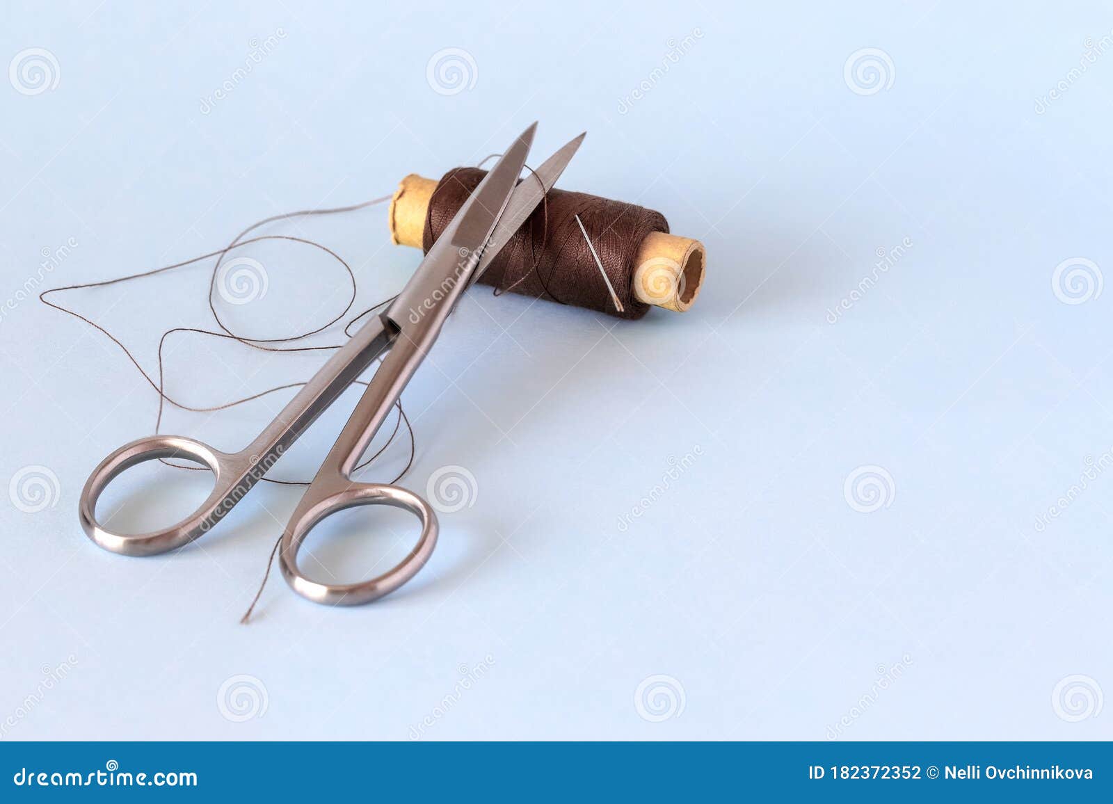 Tweezers for Sewing. Steel Bent Tweezers Isolated on White