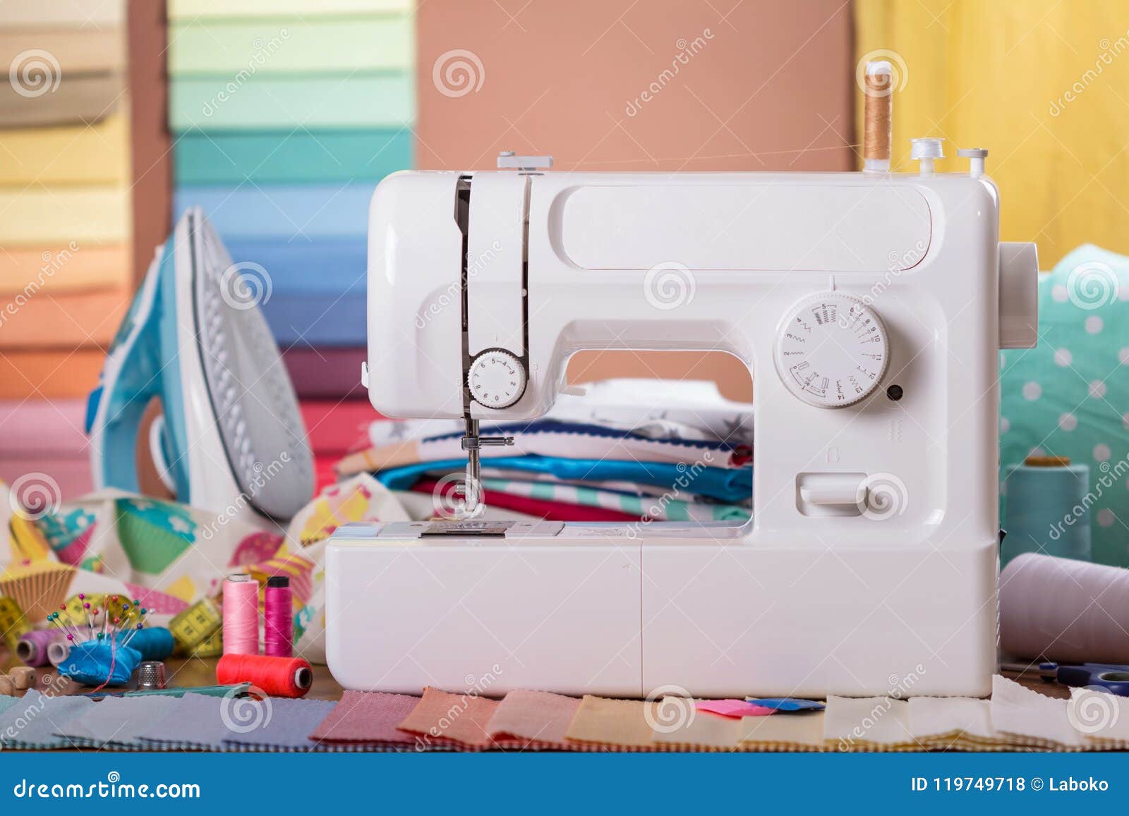 Sewing Machine, Sewing Accessories and Samples of Fabric Stock Photo