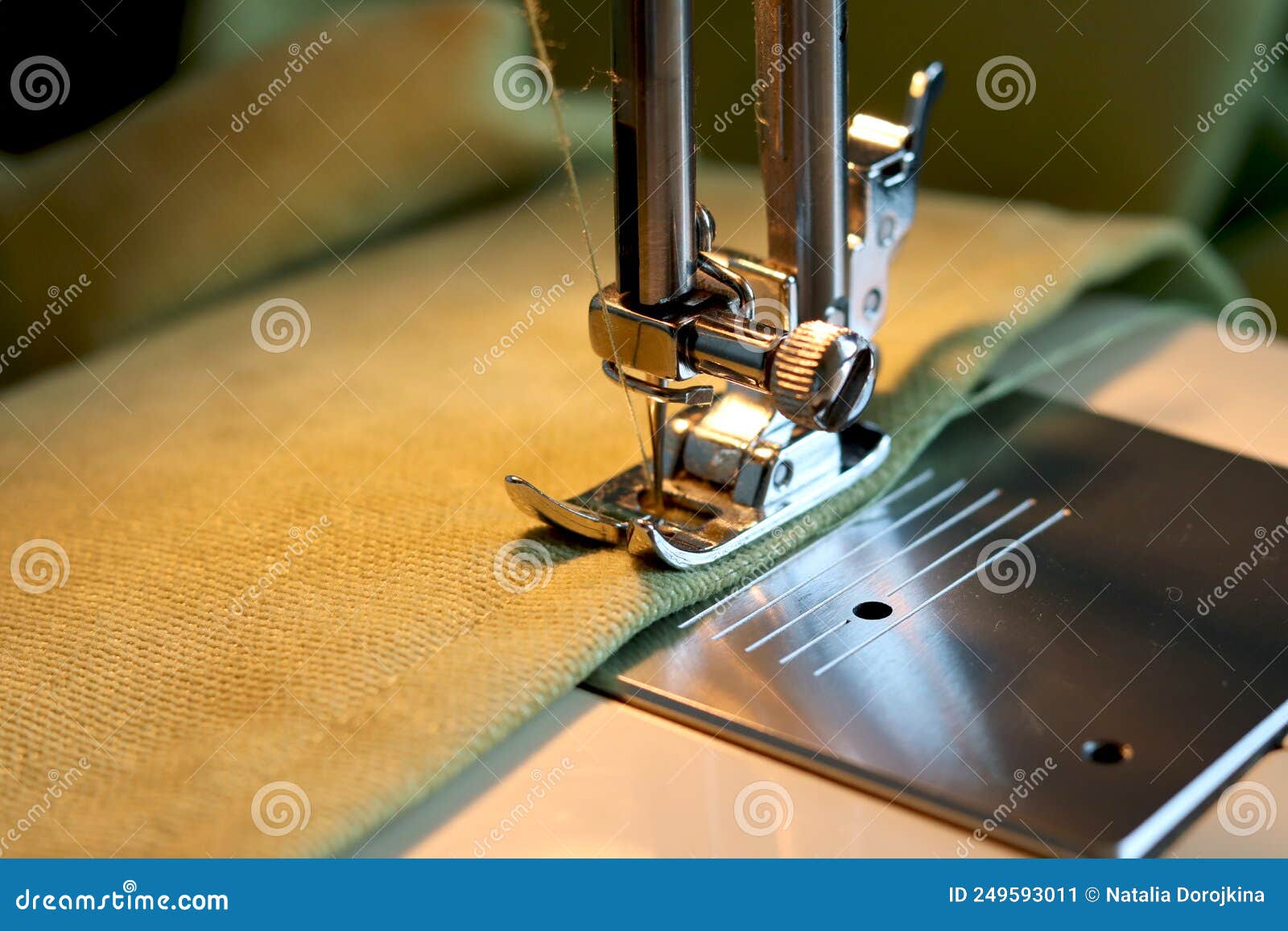 Sewing Machine with Fabric and Thread Closeup. Fabric Processing on a
