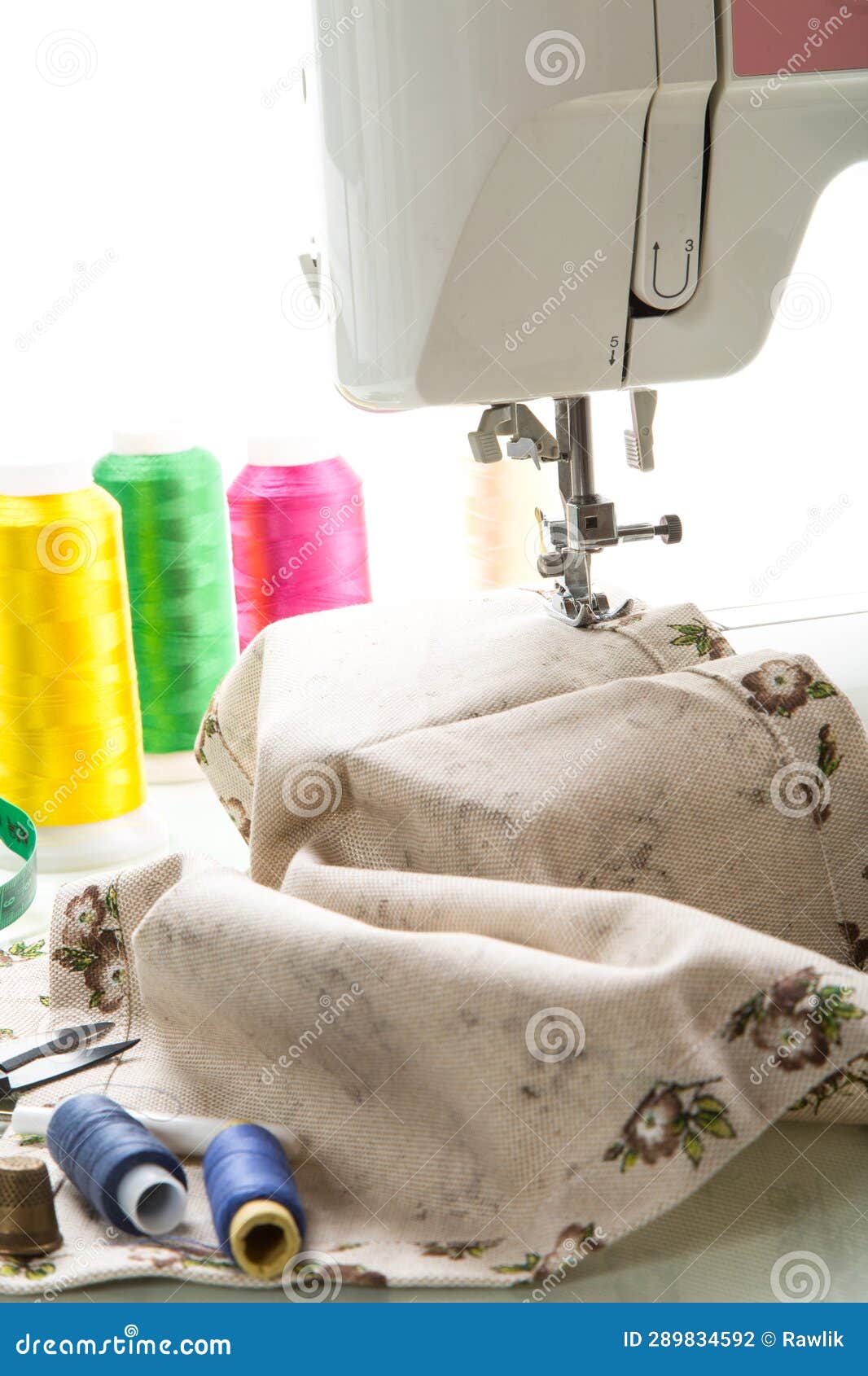 Sewing Machine with Fabric and Threads for Sewing, Closeup. the