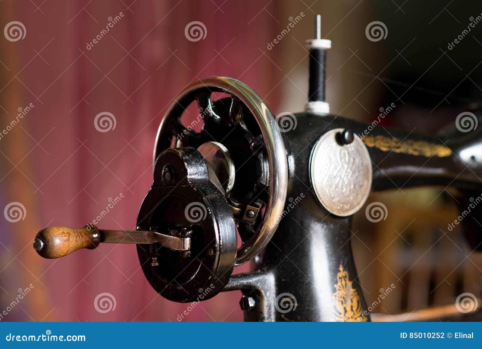 Sewing Machine Handle. Retro Industrial Equipment. Indoor Stock Photo