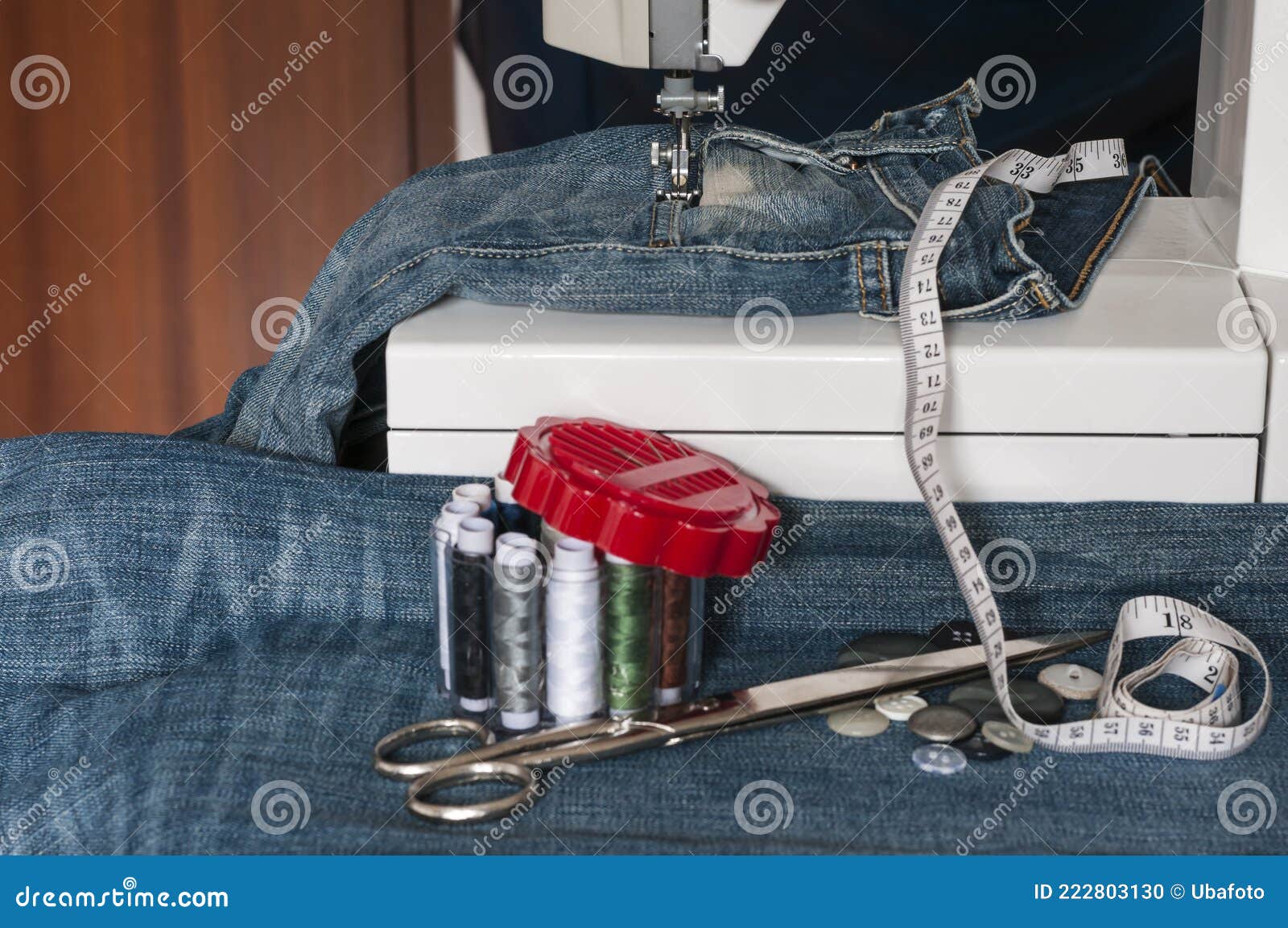 Sewing machine with jeans stock photo. Image of needle 222803130
