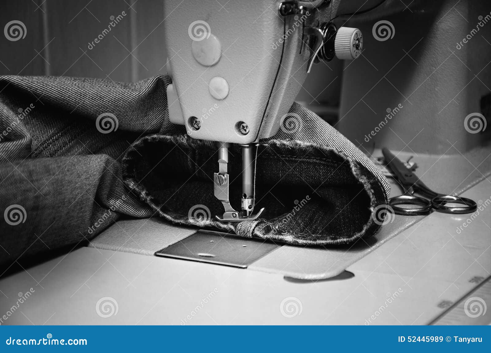 Sewing Machine and Jeans in Sewing Monochrome Stock Image