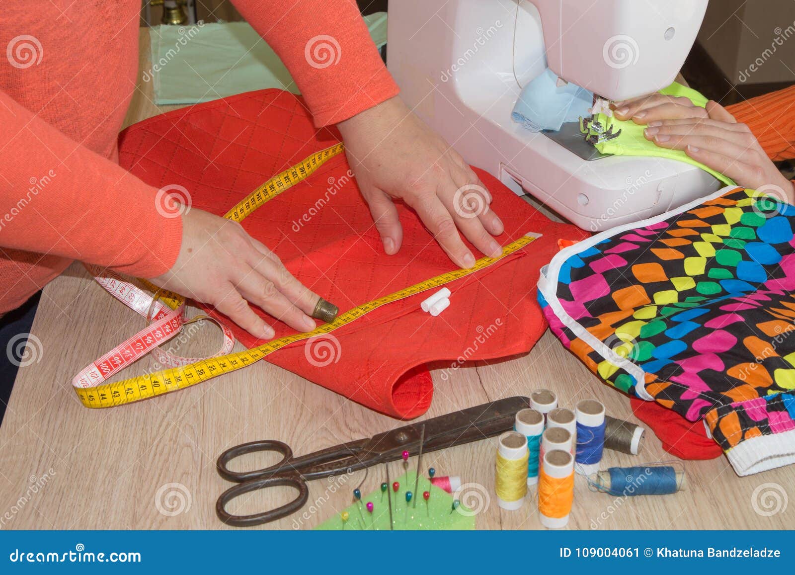 Sewing Machine.sewing Process In The Phase Of Overstitching. Dressmaker