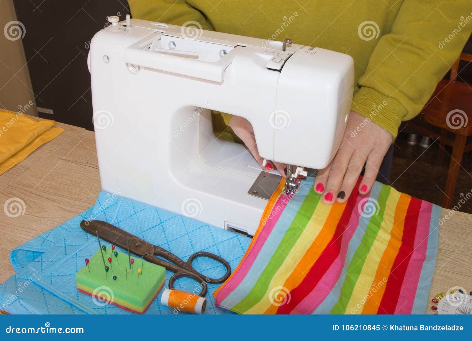 Sewing Machine.sewing Process in the Phase of Overstitching. Dressmaker