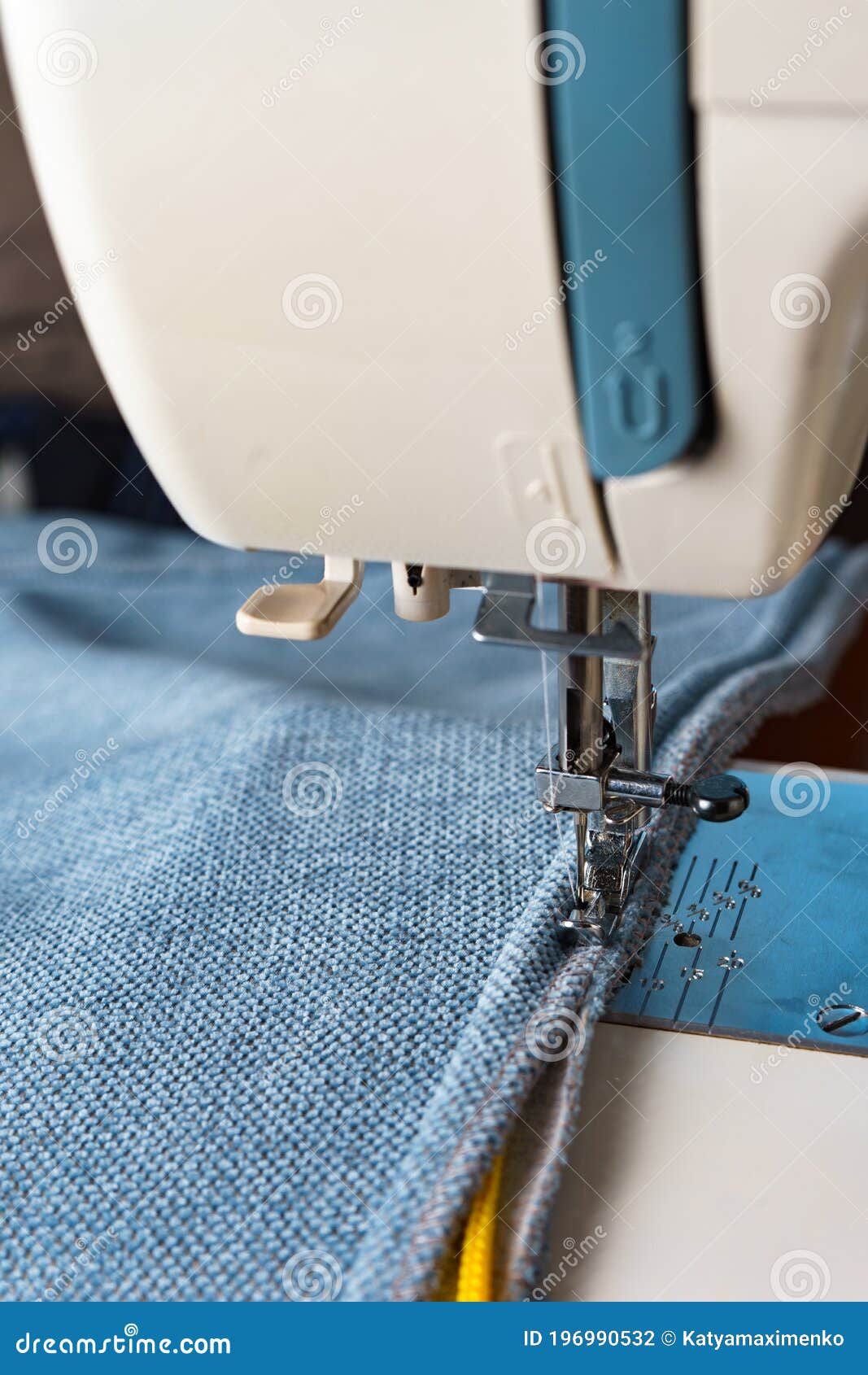 Sewing Machine. the Process of Sewing a Decorative Cord of Blue Fabric