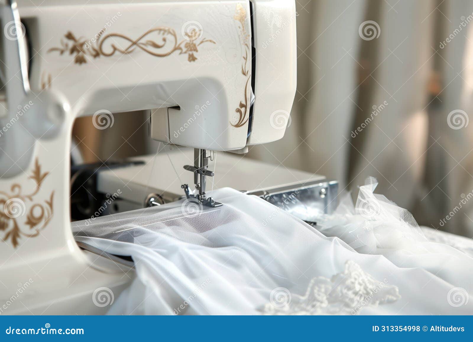 Sewing Machine with Wedding Dress Fabric Under Needle Stock Photo