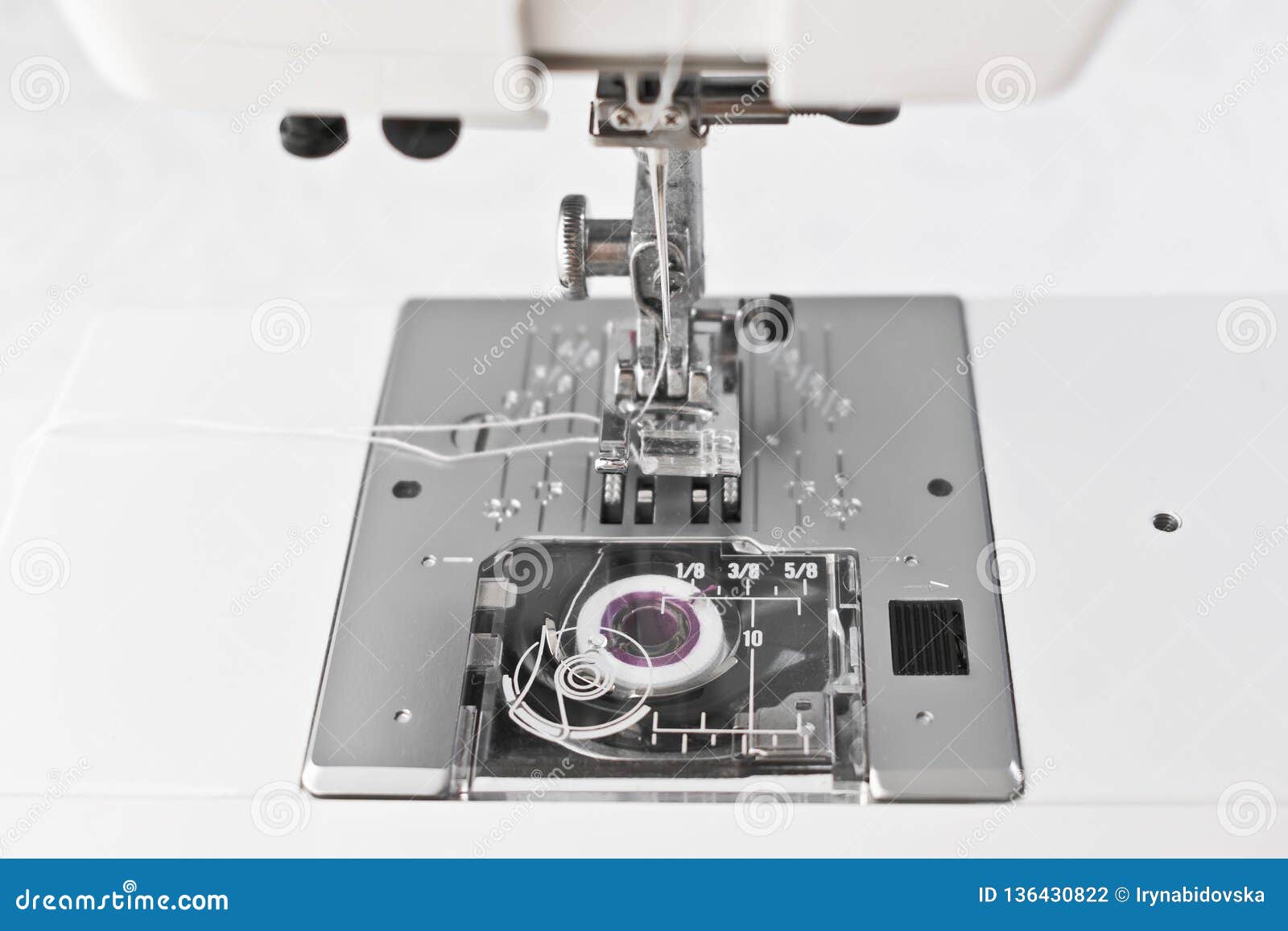 Sewing Machine Working Parts, Presser Foot Needle and Spool Stock Photo