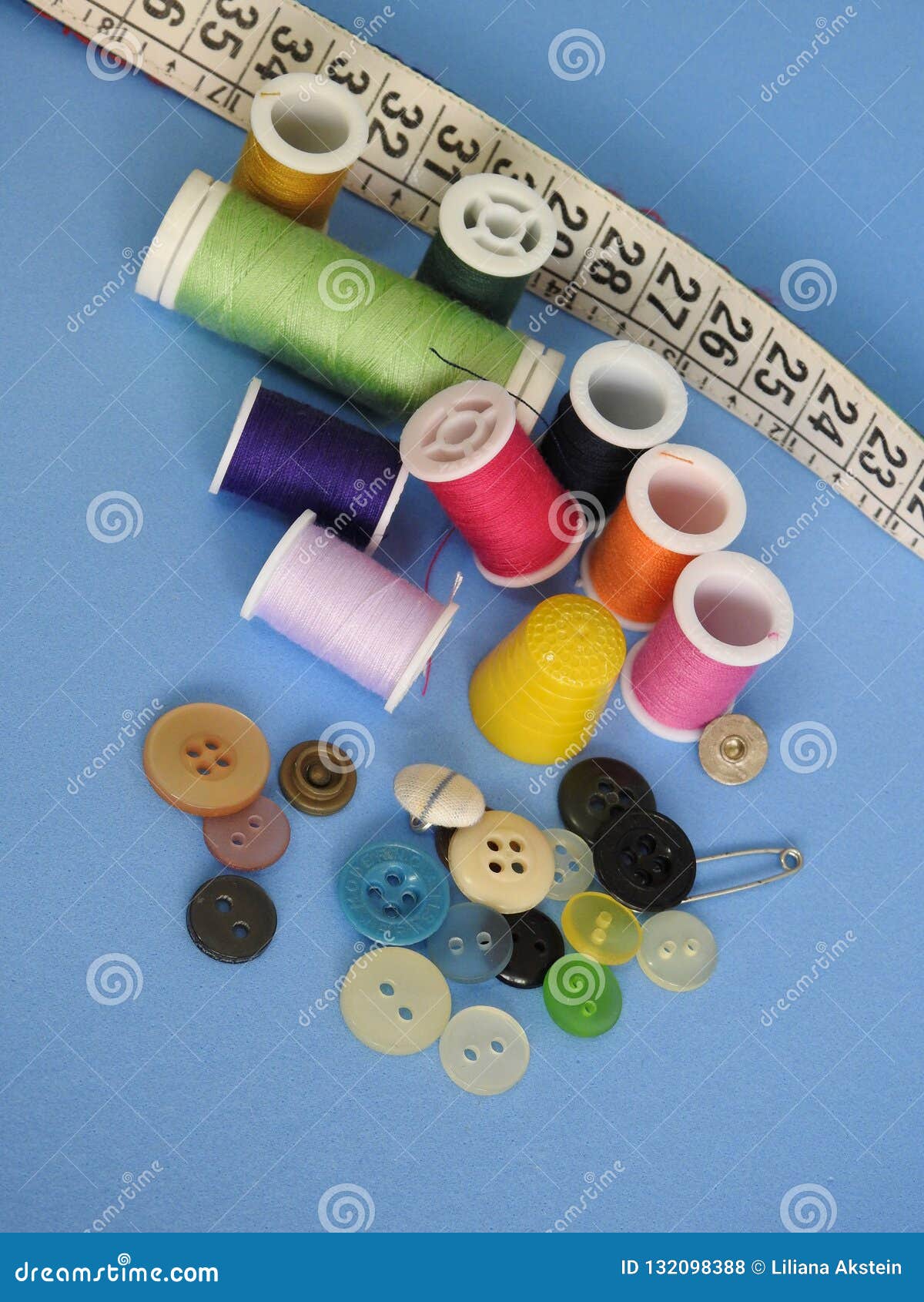 Sewing Materials Arranged on a Blue Surface Stock Photo Image of