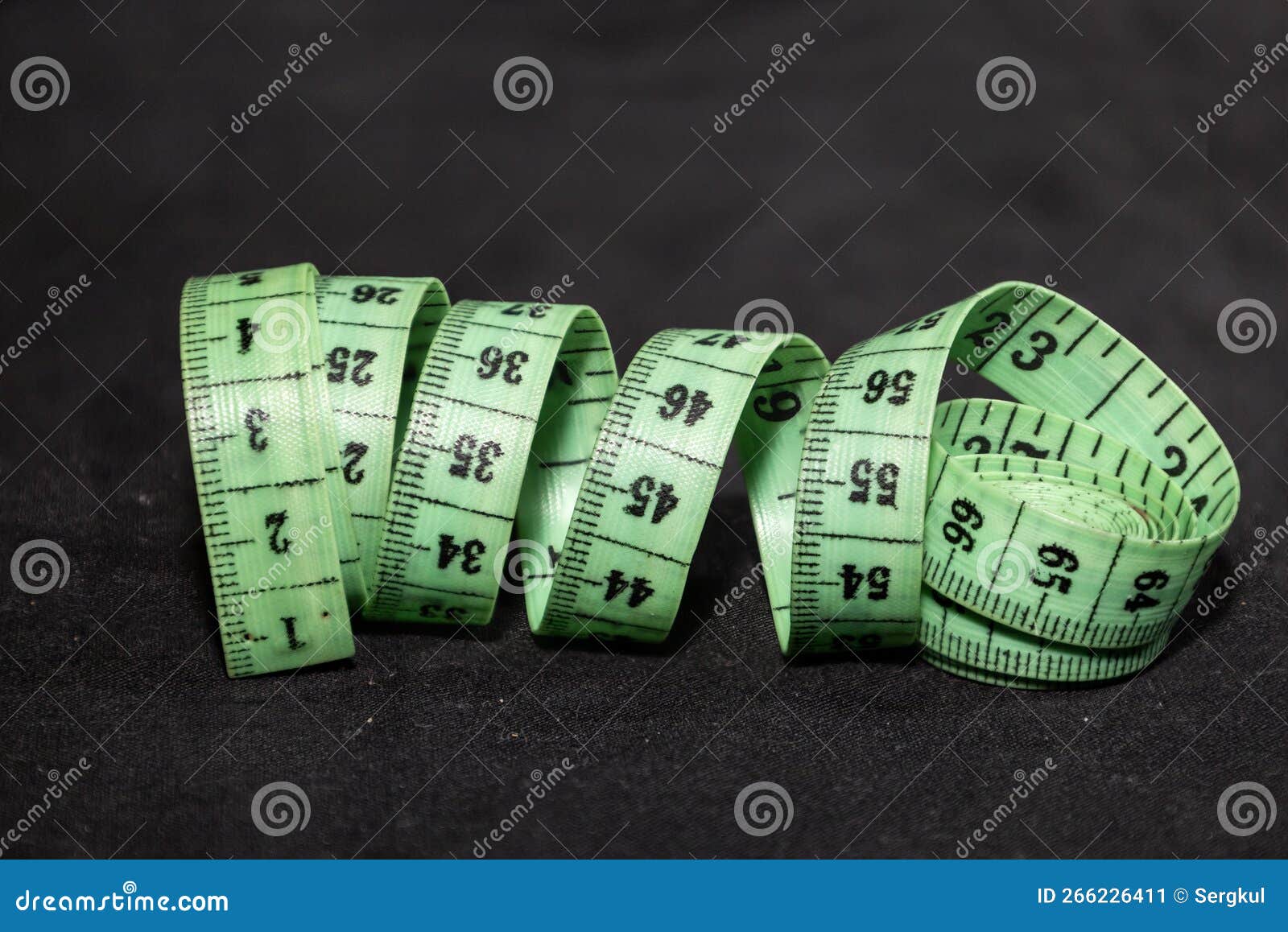 sewing measuring tape with divisions in centimeters and millimeters,