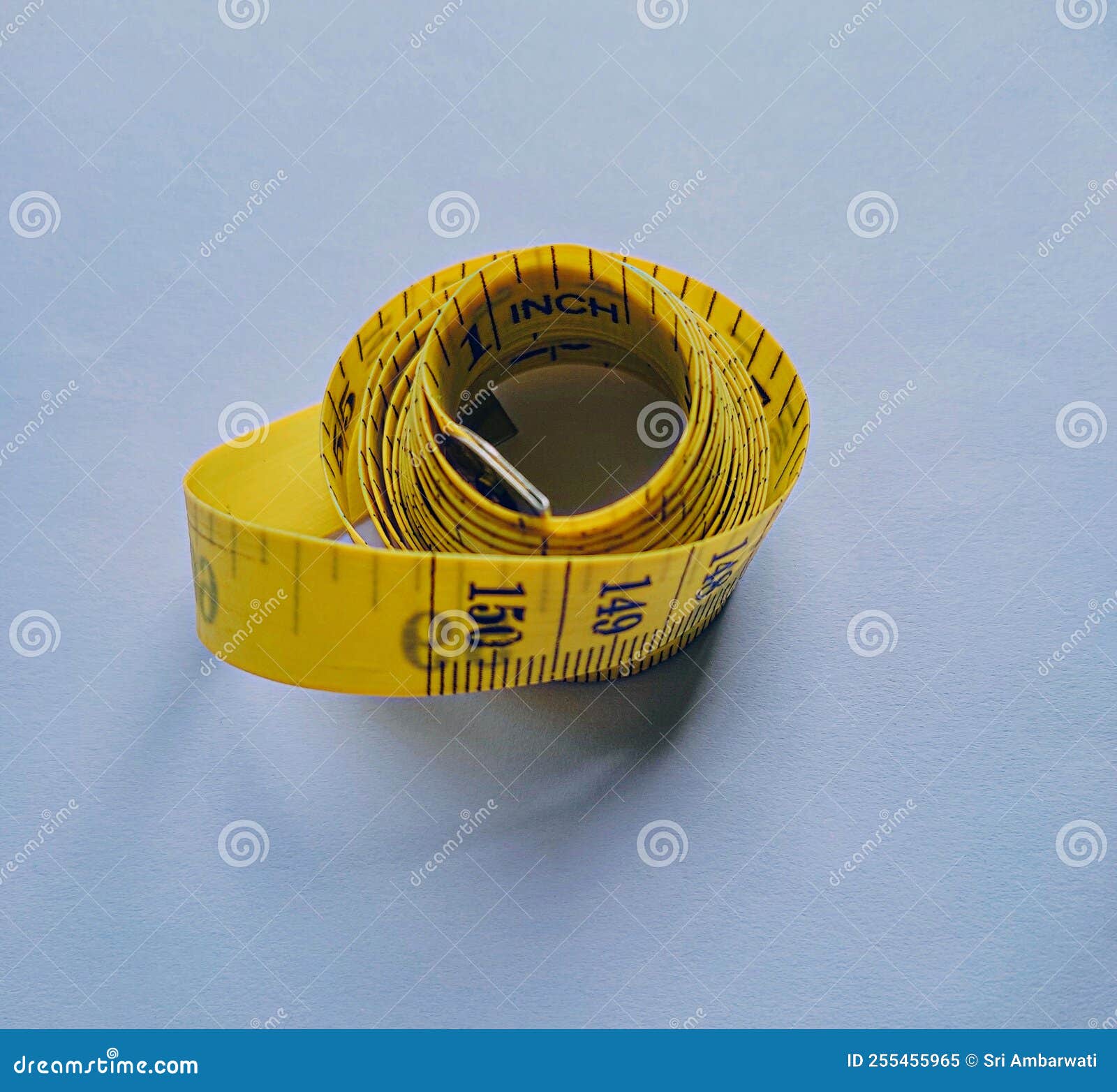 3d Rendering Of A Yellow Flexible Sewing Tape Measure In A