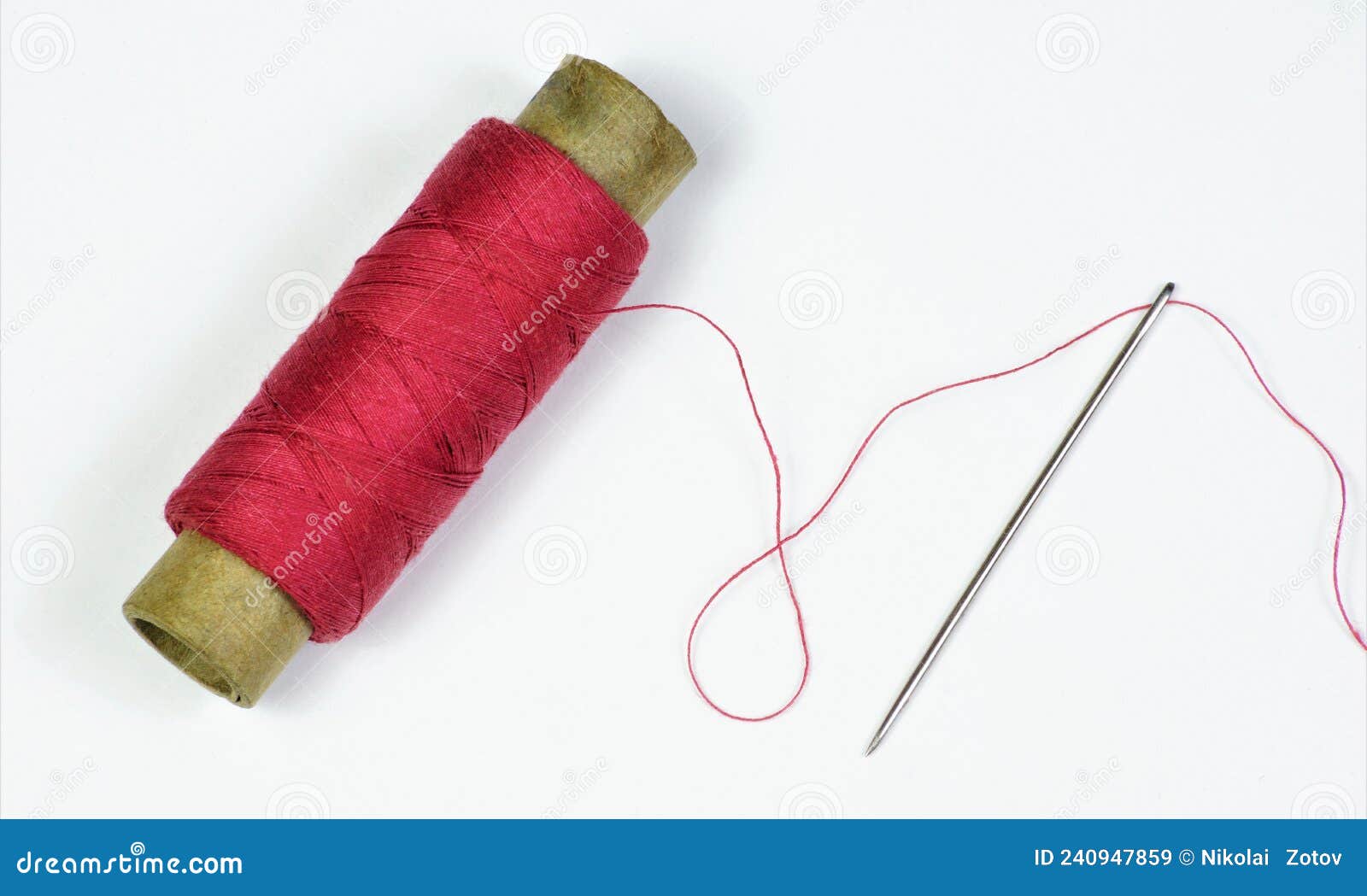 The Sewing Needle is a Pointed Tool and a Red Thread Threaded into the ...