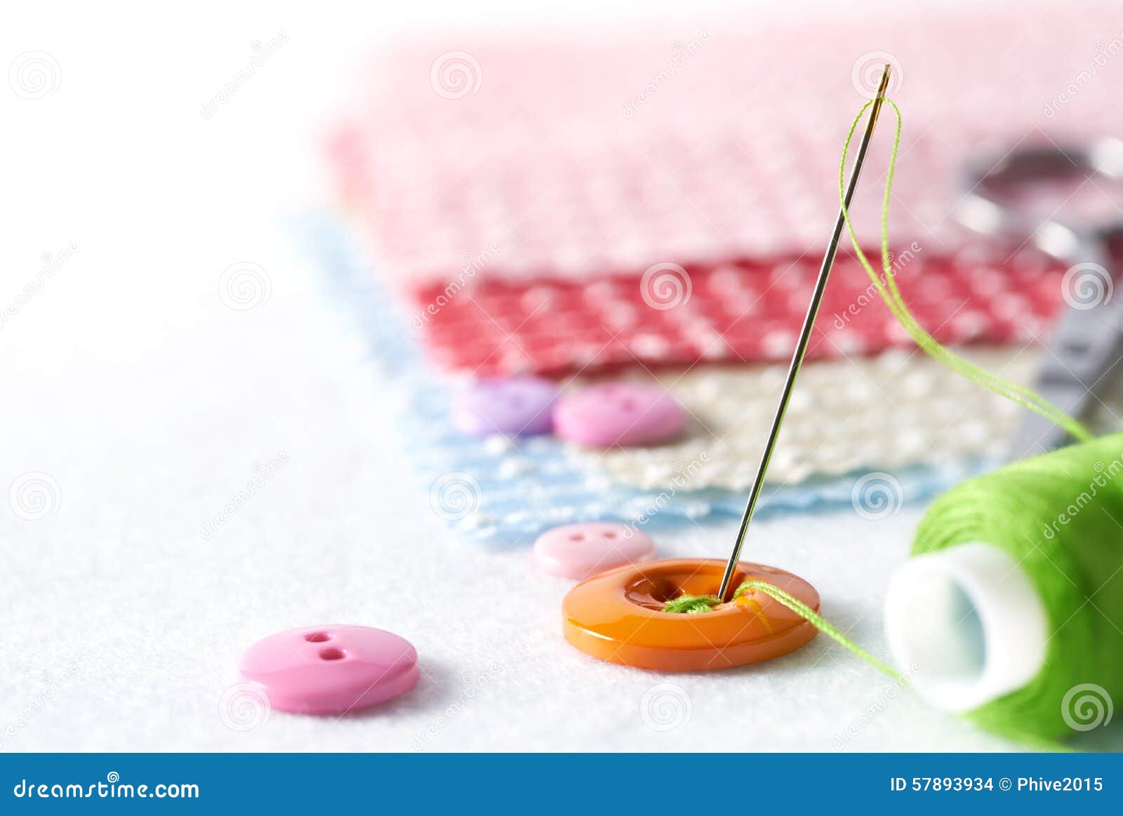 Sewing Needle and Thread with Buttons Stock Photo Image of orange