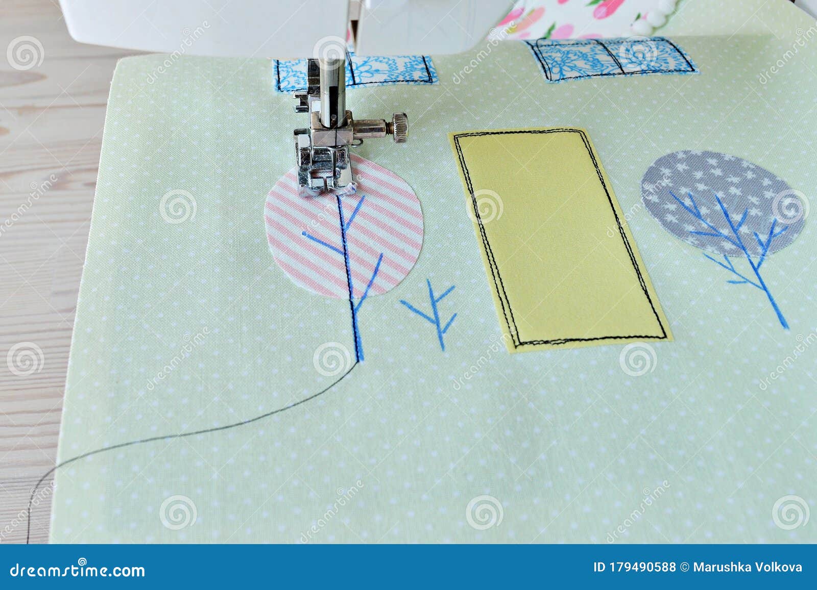 Sewing Process Pieces of Fabric, Applique, Needle and Thread Stock