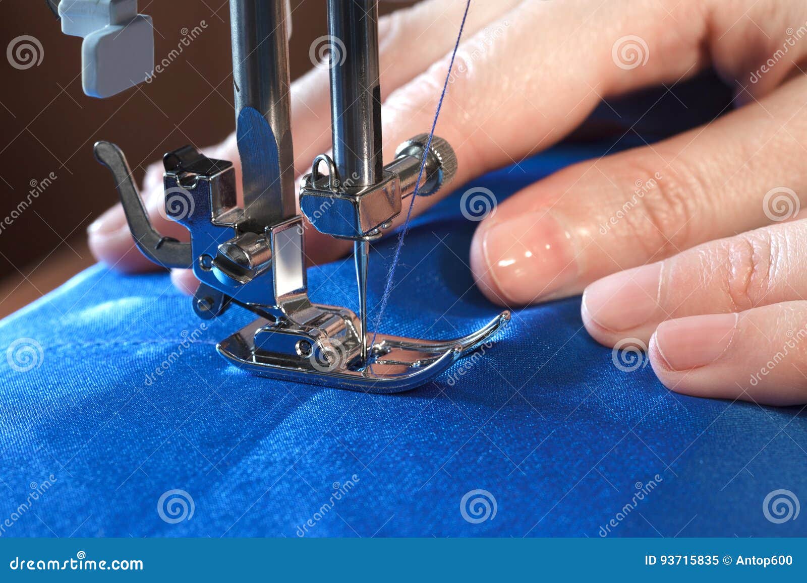 Sewing process, side view stock image. Image of foot 93715835