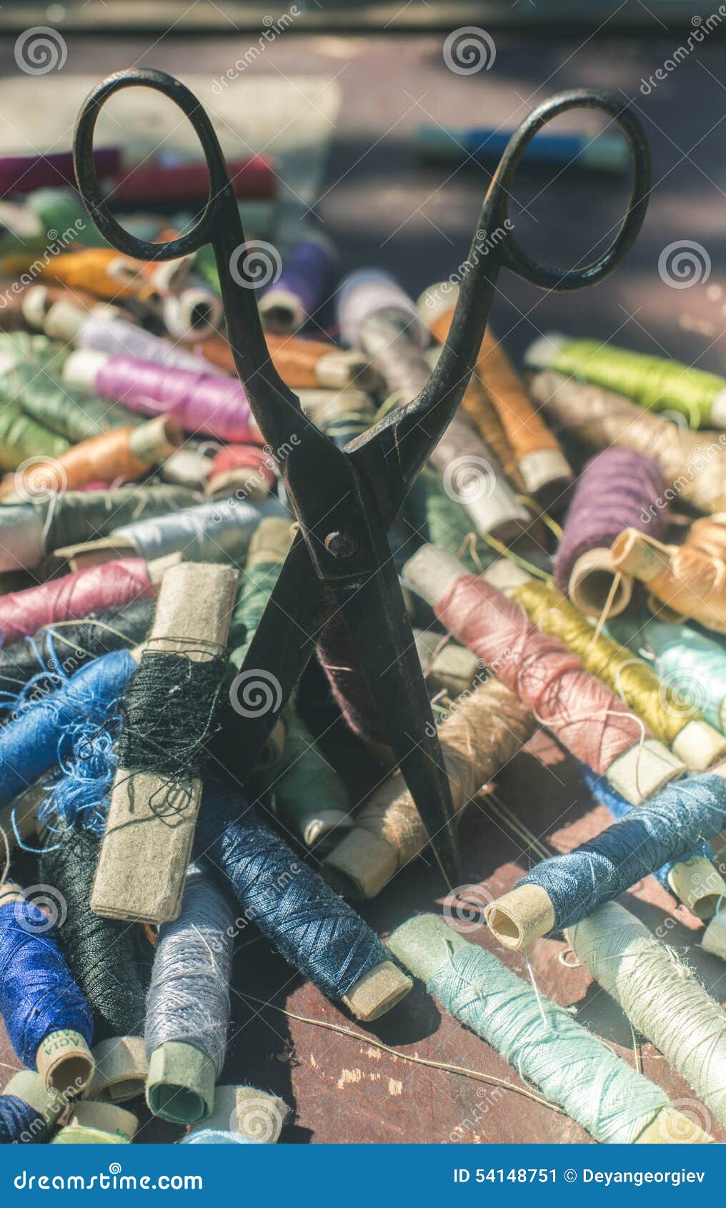 Sewing thread and scissors stock image. Image of fabric 54148751