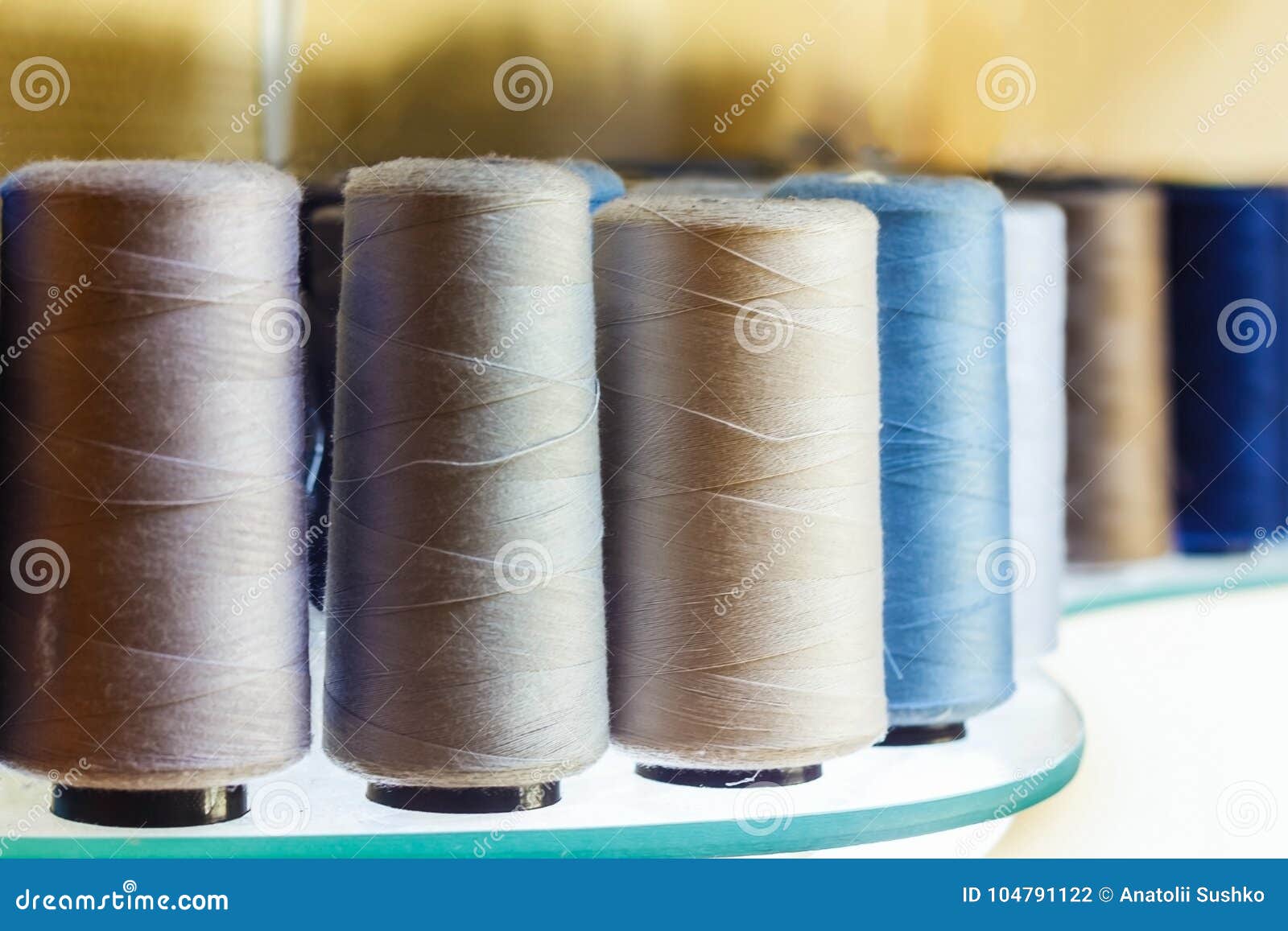 Sewing Threads in Assortment Closeup on the Shelf. Stock Photo Image of colors, macro 104791122