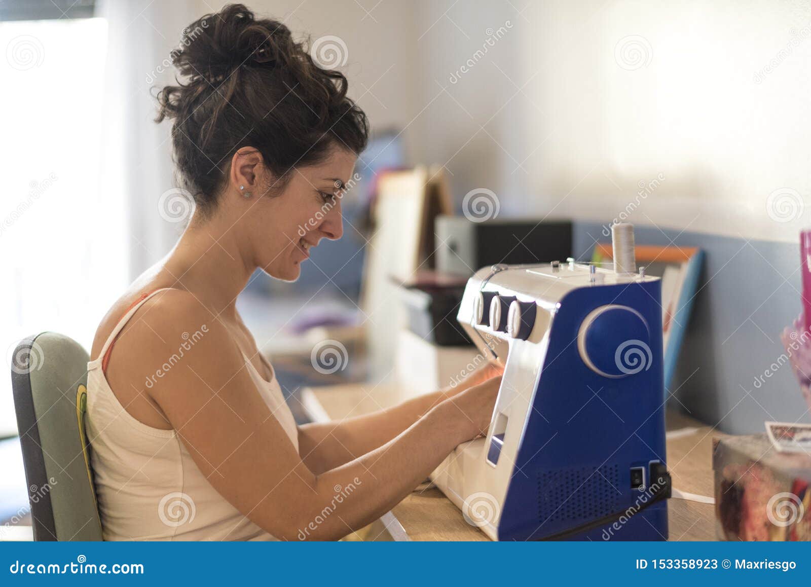 Sewing woman at home stock image. Image of profile, dark 153358923