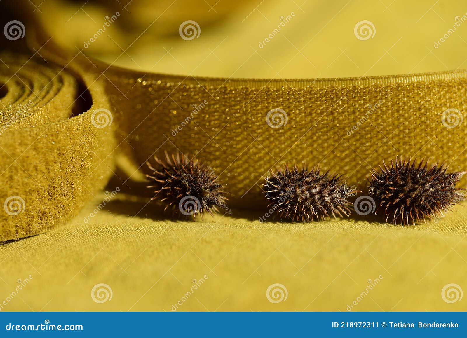 Sewing Yellow Velcro Tape in a Roll Closeup on a Yellow Background