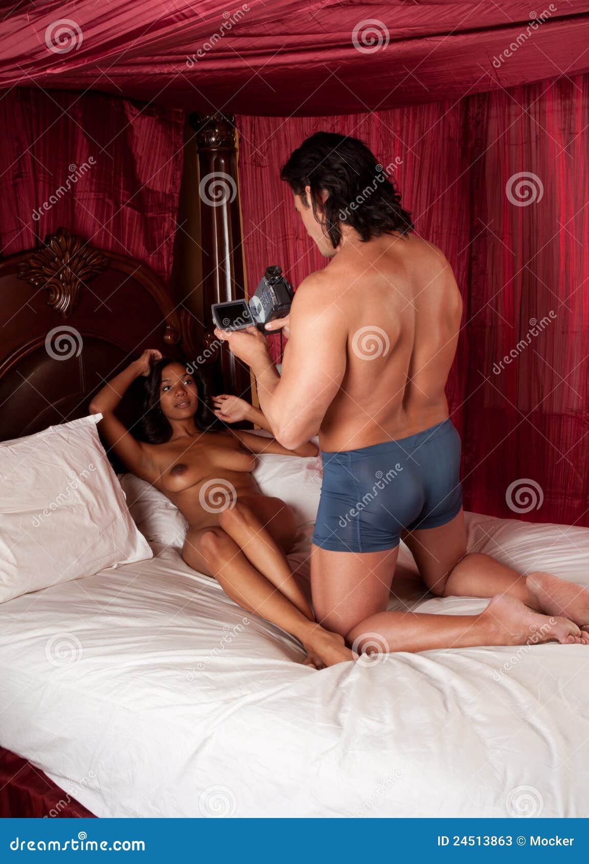 Sex Video Interracial Couple Man Films Naked Woman Stock Image photo