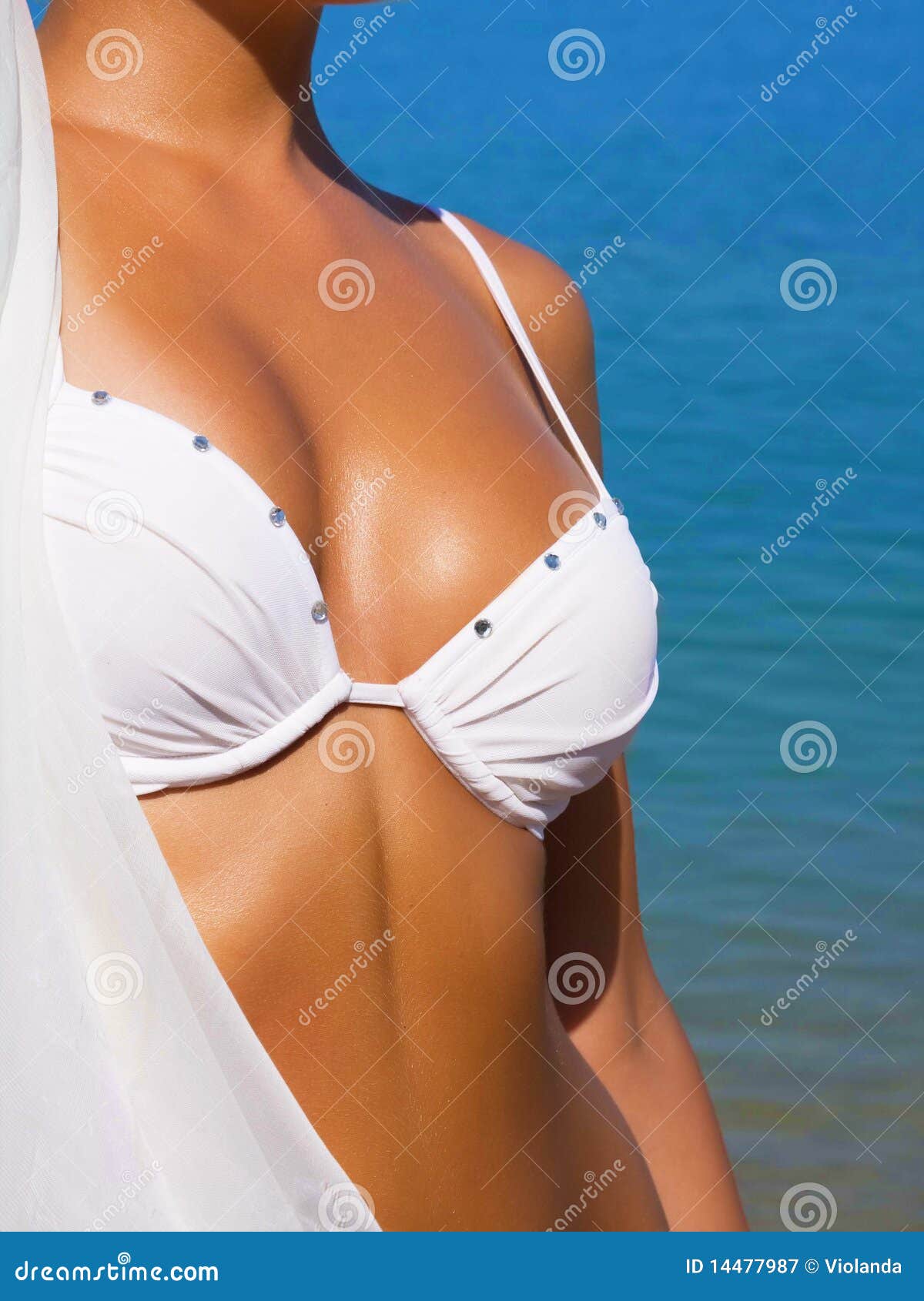 sexual female body on a beach