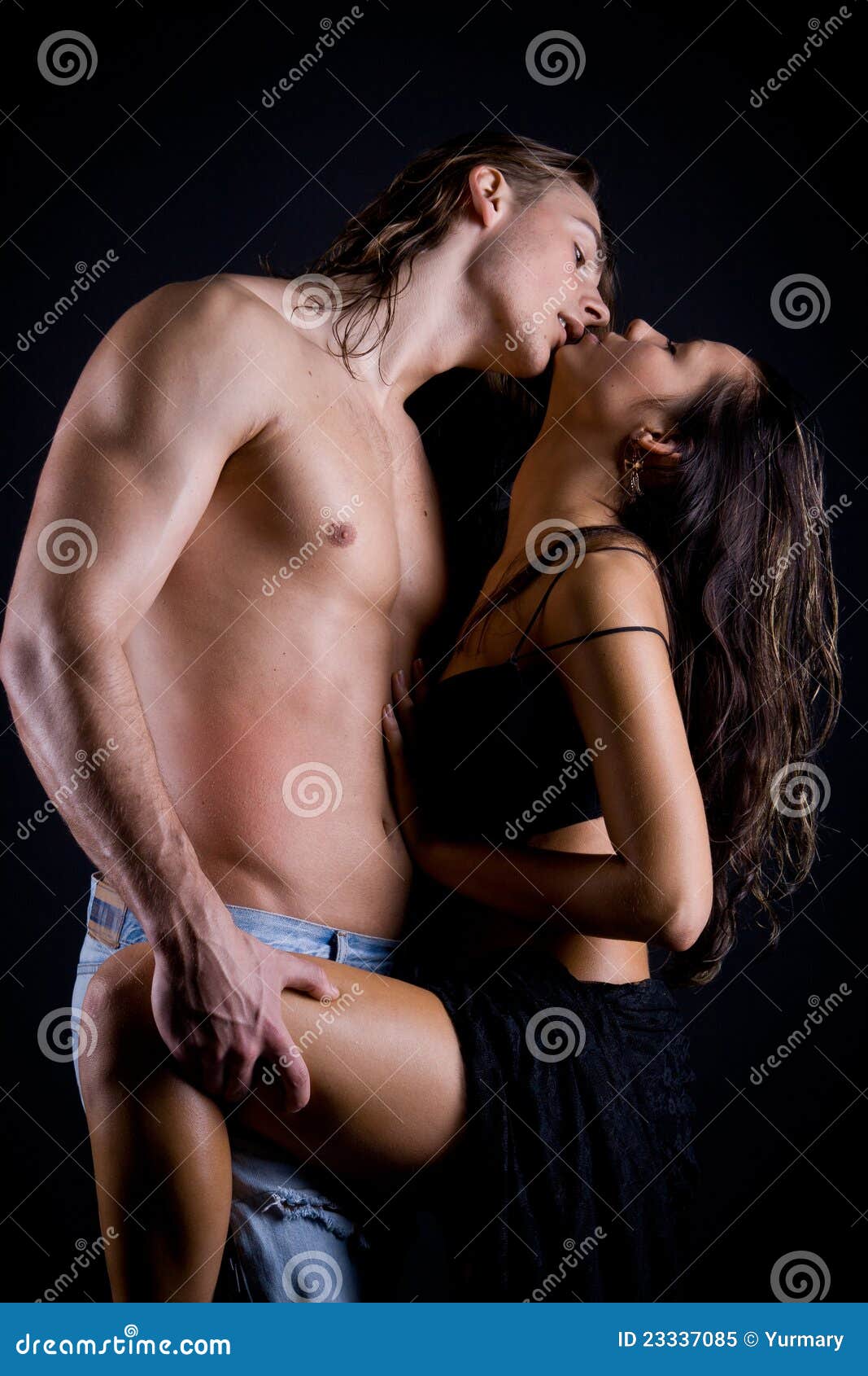 Sexual Foreplay, Girl in Hug of a of a Strong Man Stock Image pic