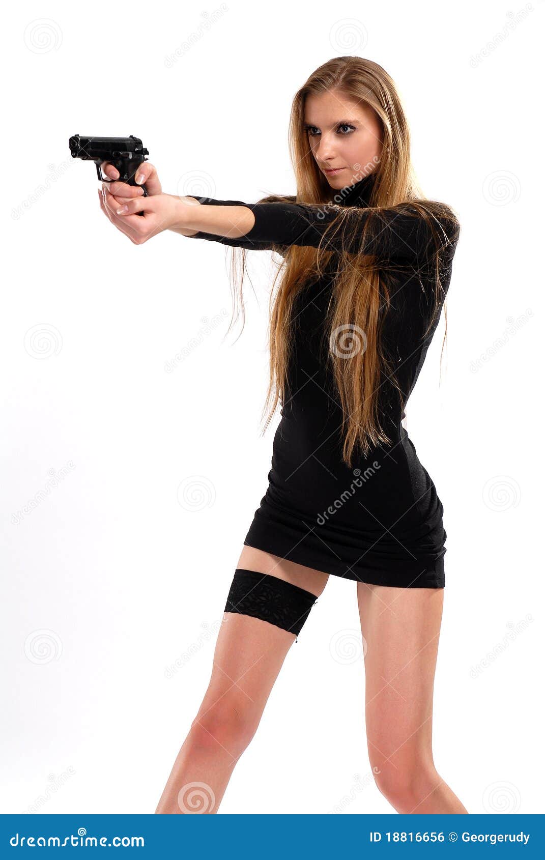 Sexual girl with a pistol stock photo. Image of flexibility - 18816656