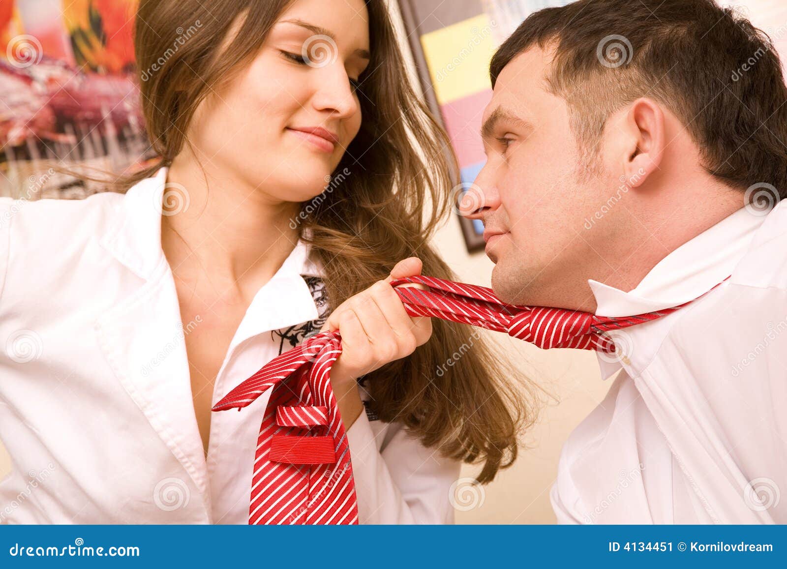 Sexual Young Woman in Formal Suit Holding in Fist Stock Image