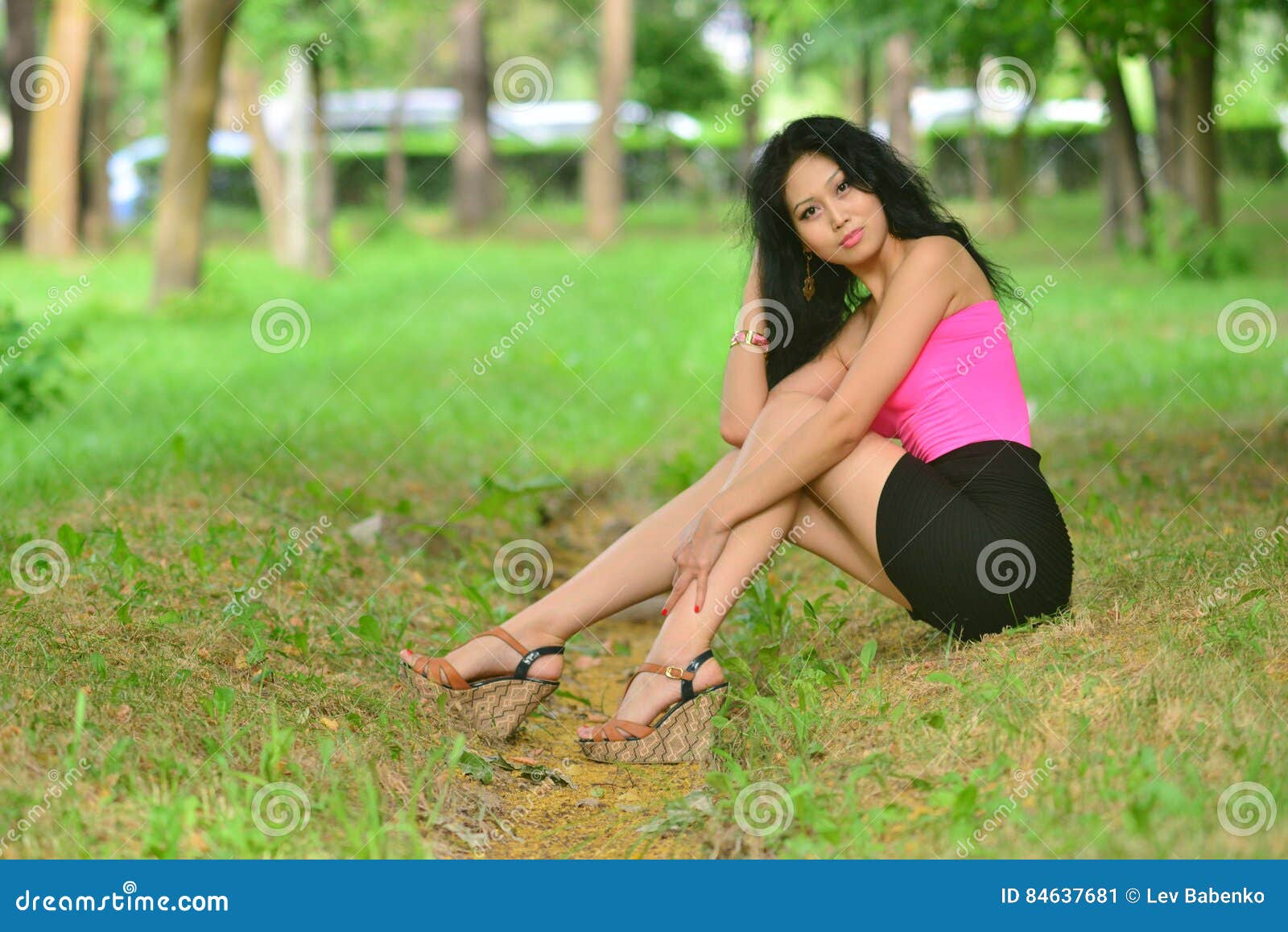 Sexual Young Woman Withlong Black Hair In A Bright Blouse Posing In Nature Stock Image Image 