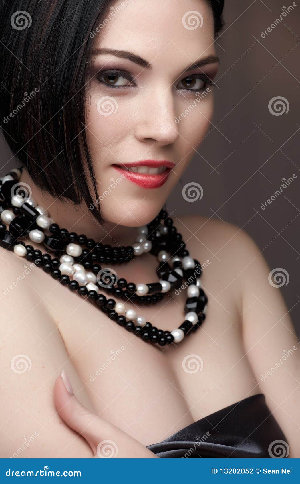 Nude Woman With Pearl Necklace