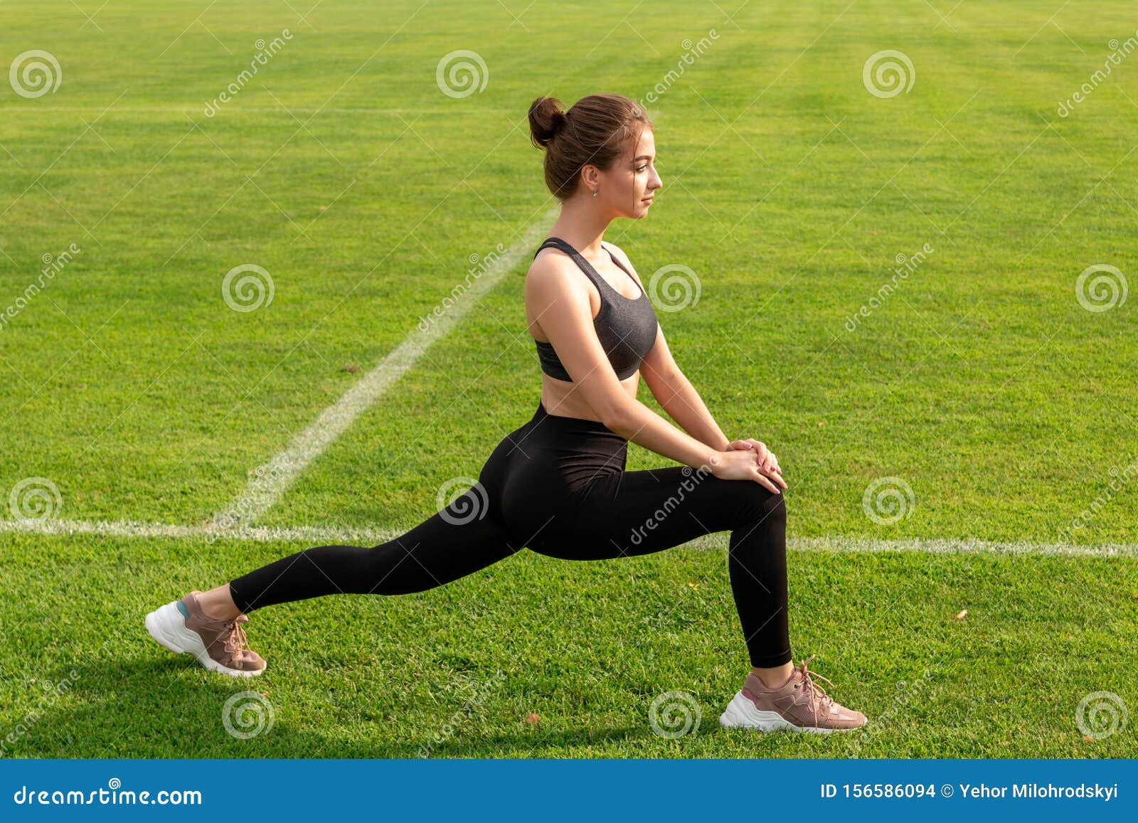 Athletic Girl Doing Stretching on the Grass Stock Photo - Image of girl,  healthy: 156586094