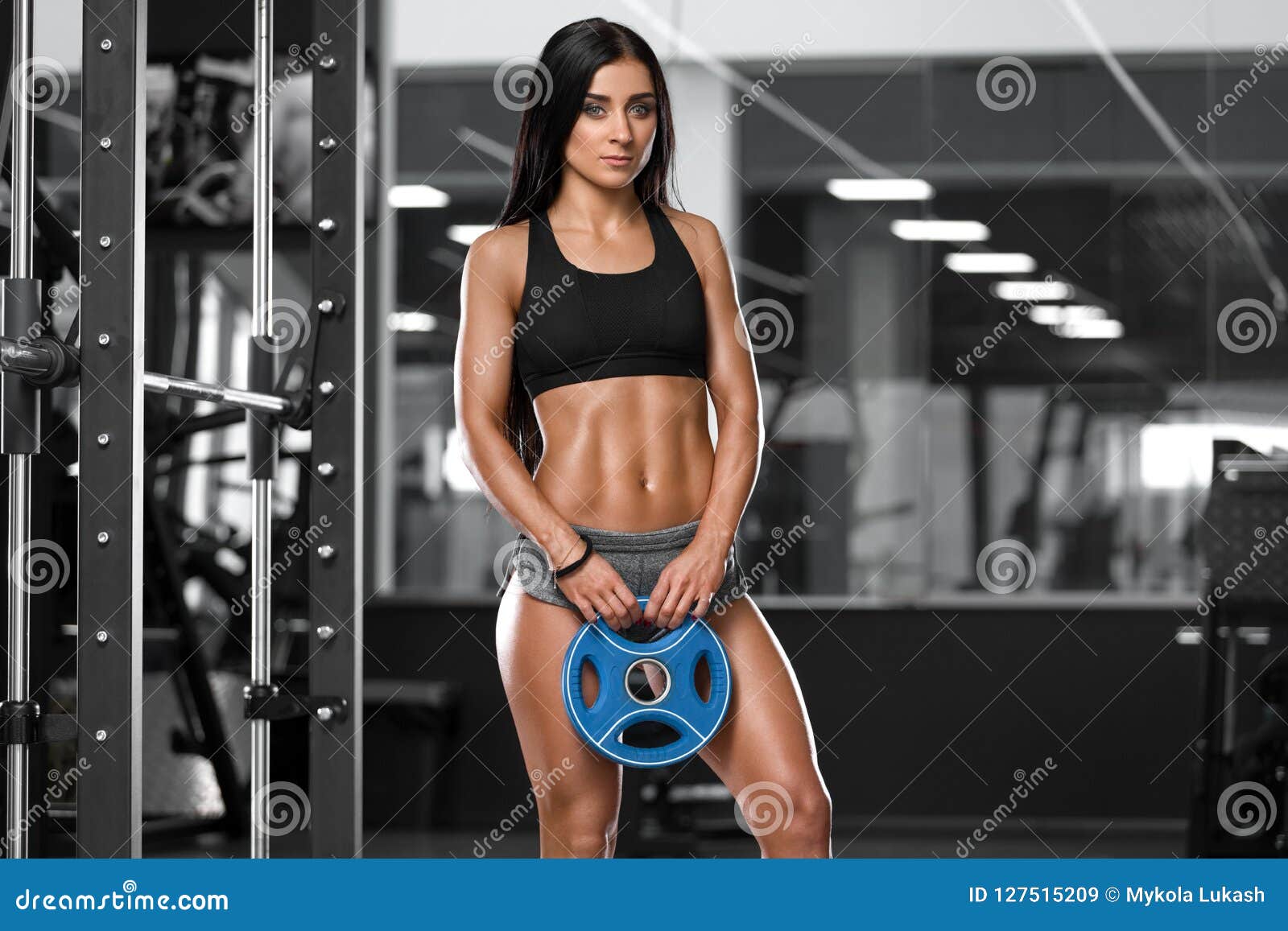 Athletic Girl Working Out in Gym. Fitness Woman Doing Exercise Stock Photo  - Image of attractive, barbell: 133352988