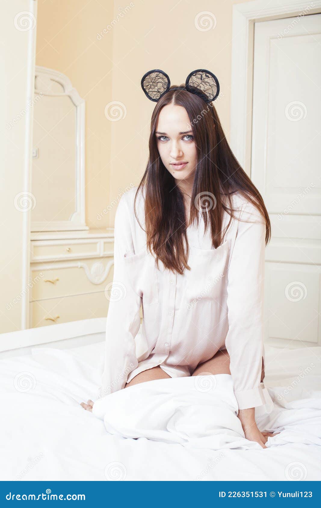 Beautiful Brunette Woman Lying In Bed Sensual Looking At Camera Seduction Concept In Luxury 