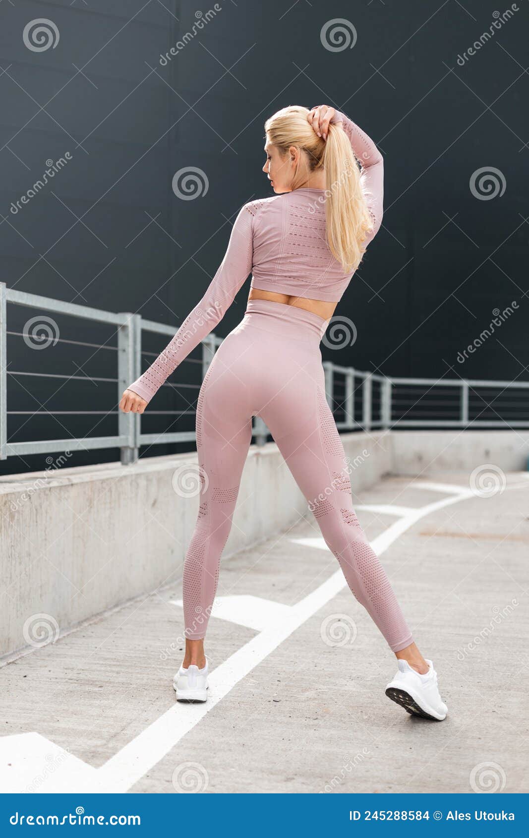 Beautiful Fitness Blonde Model Woman with Slim Fit Body and Booty in  Fashion Sportswear with White Jogging Sneakers and Pink Stock Photo - Image  of model, caucasian: 245288584