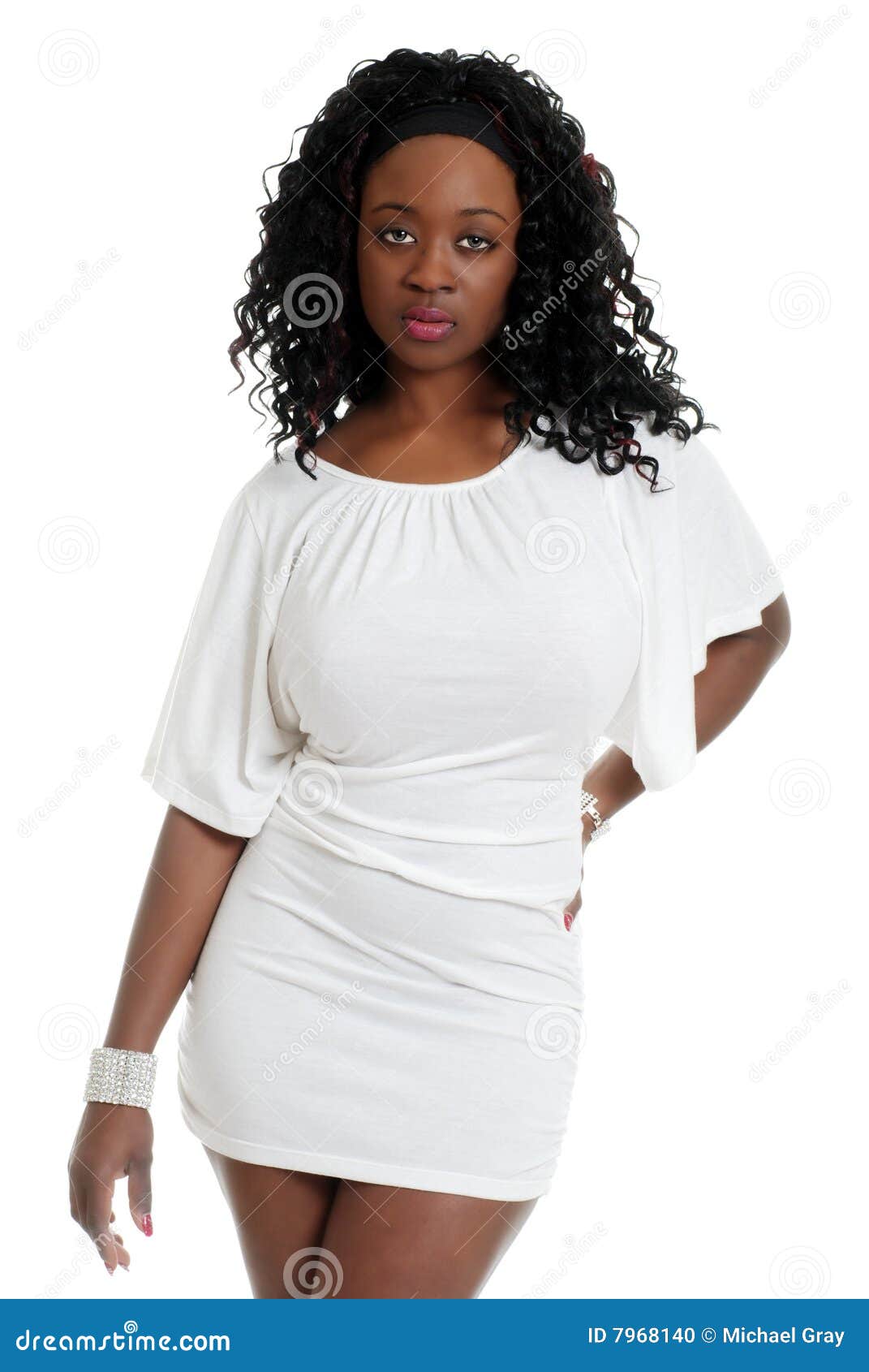 Black Woman Wearing A Short White Dress 