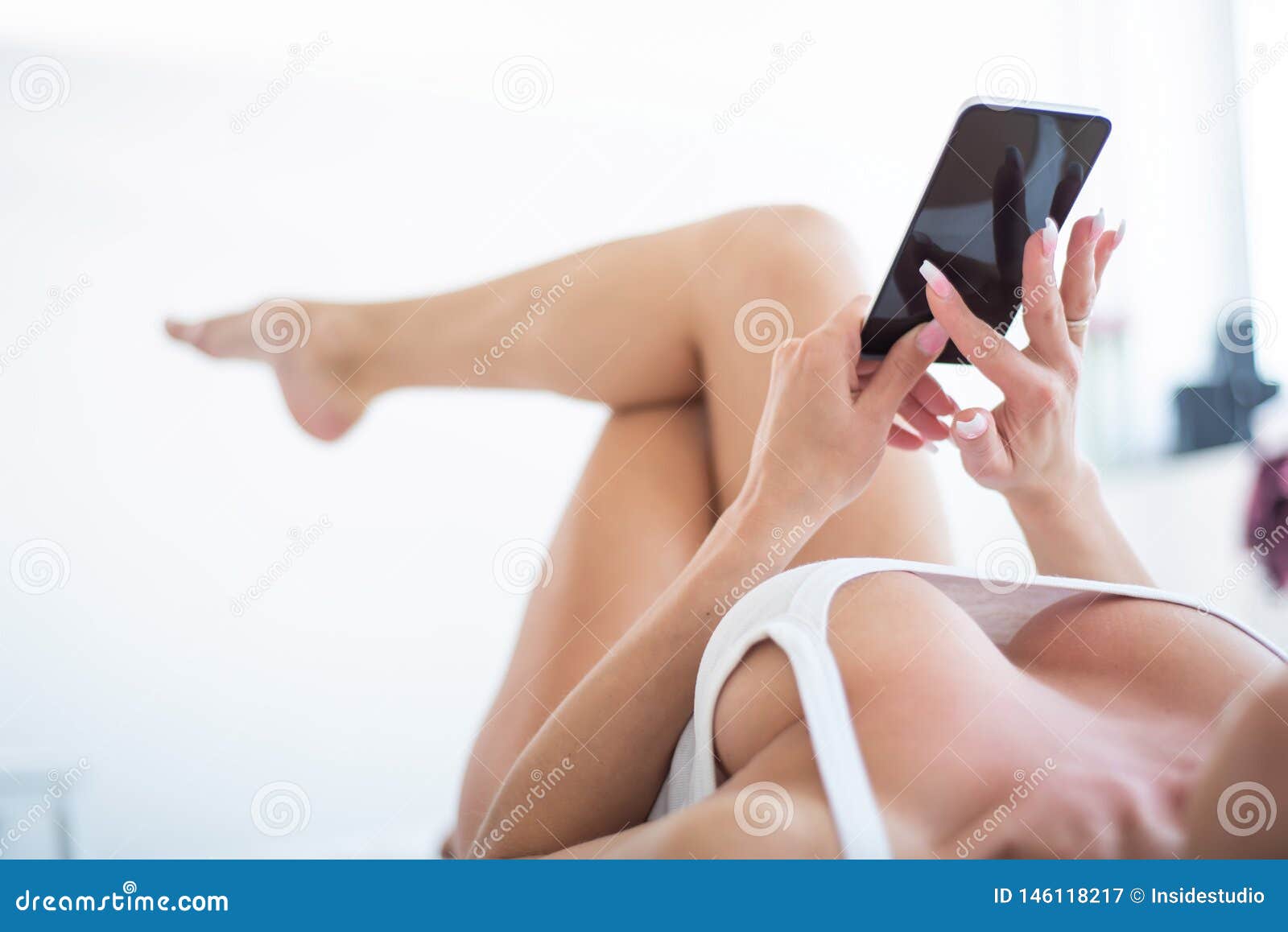 Blonde with Big Breasts in a White T-shirt Holding a Smartphone. Private  Video Chat. Large Top View. Stock Image - Image of screen, correspondence:  146118217