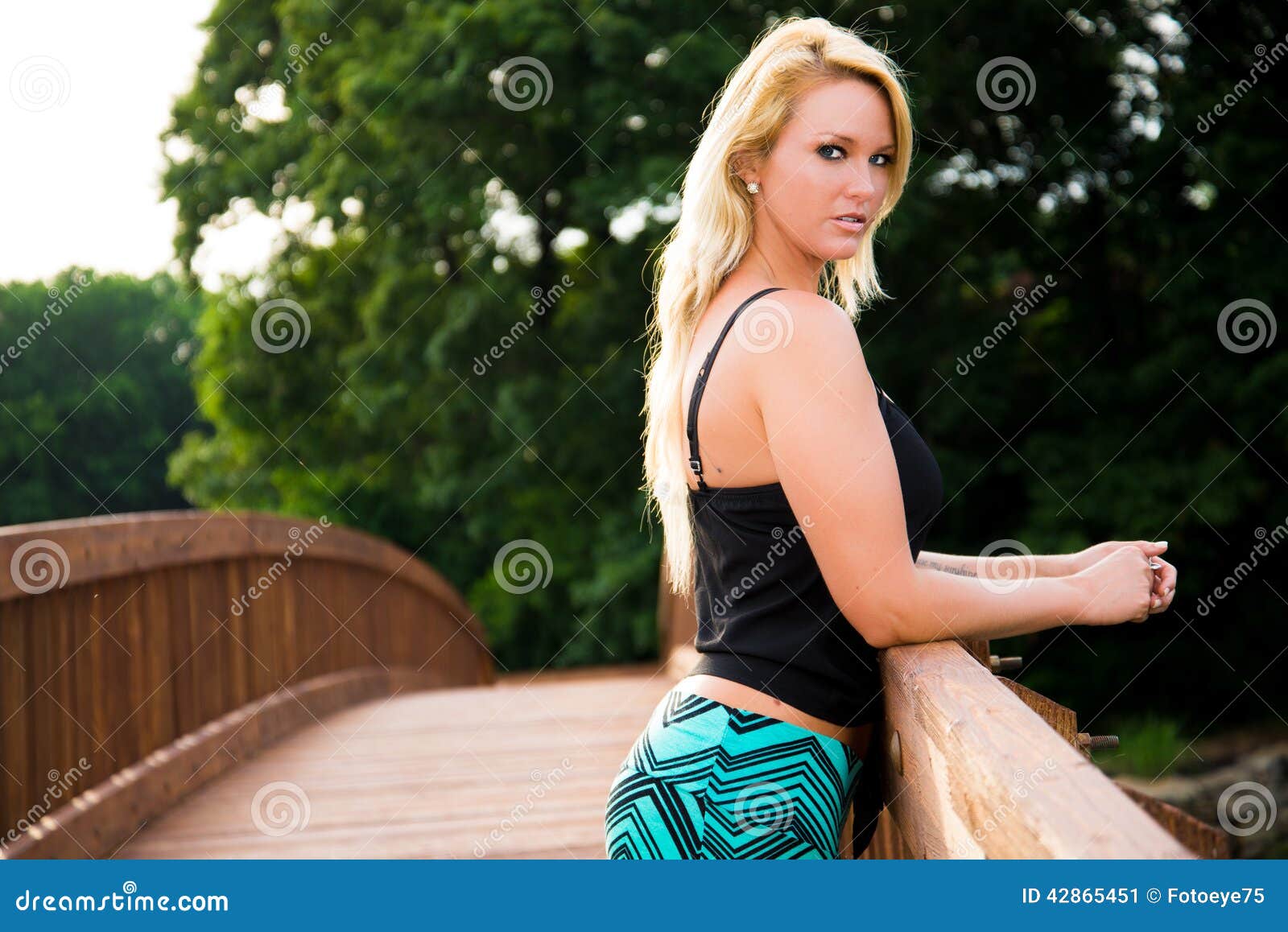 Plastic clothes. Professional blonde-haired model posing in plastic clothes  participating in ecology campaign Stock Photo - Alamy