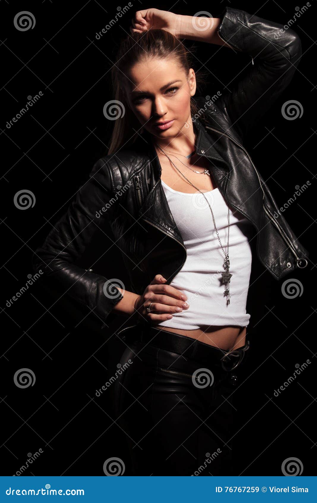 Blonde Woman in Leather Clothes Poses Stock Image - Image of hold ...