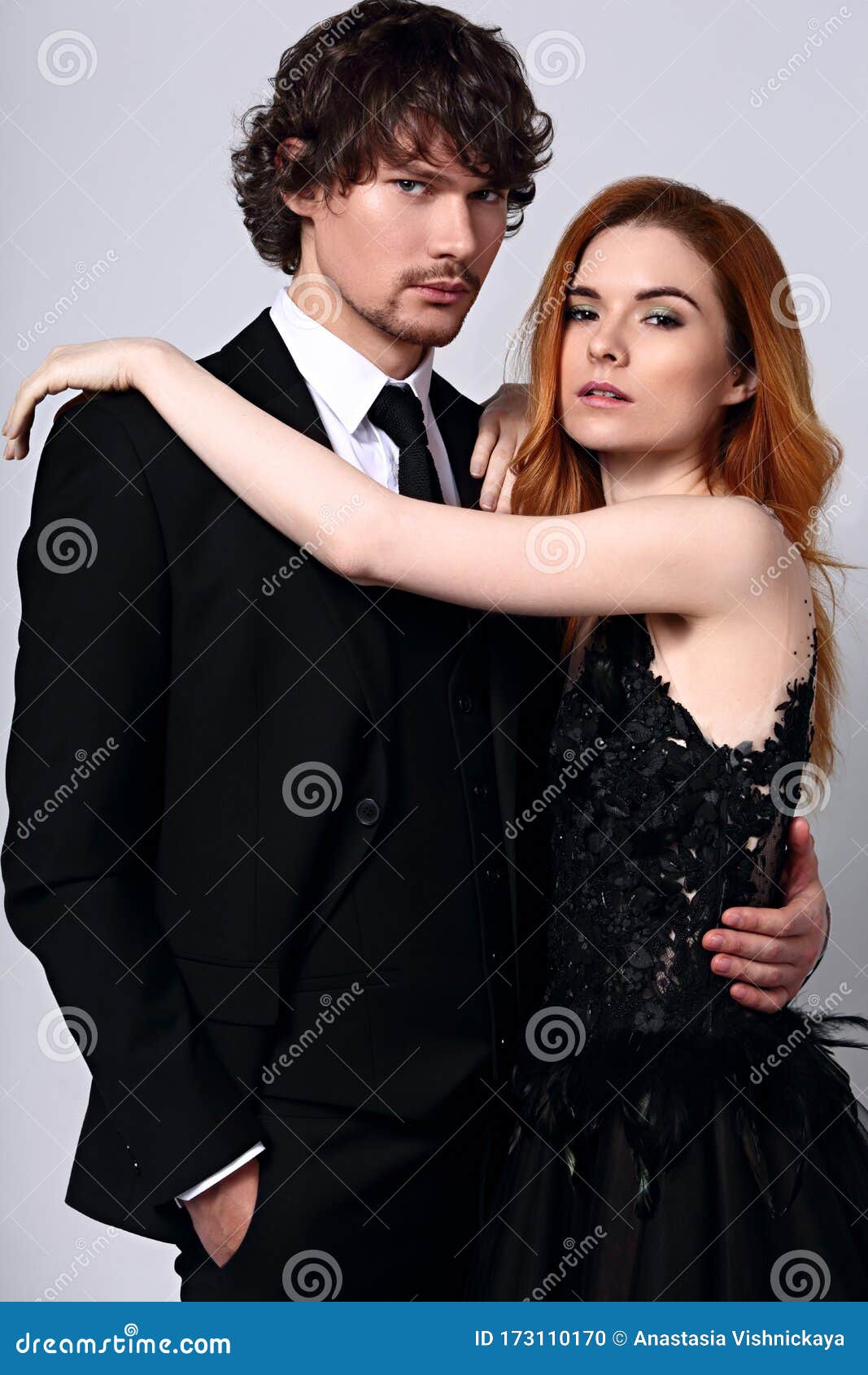 Bright Foxy Hairstyle Female Woman in Fashion Black Long Skirt Dress  Hugging Her Handsome Man in Black Suit Clothing on Light Stock Photo -  Image of hair, love: 173110170