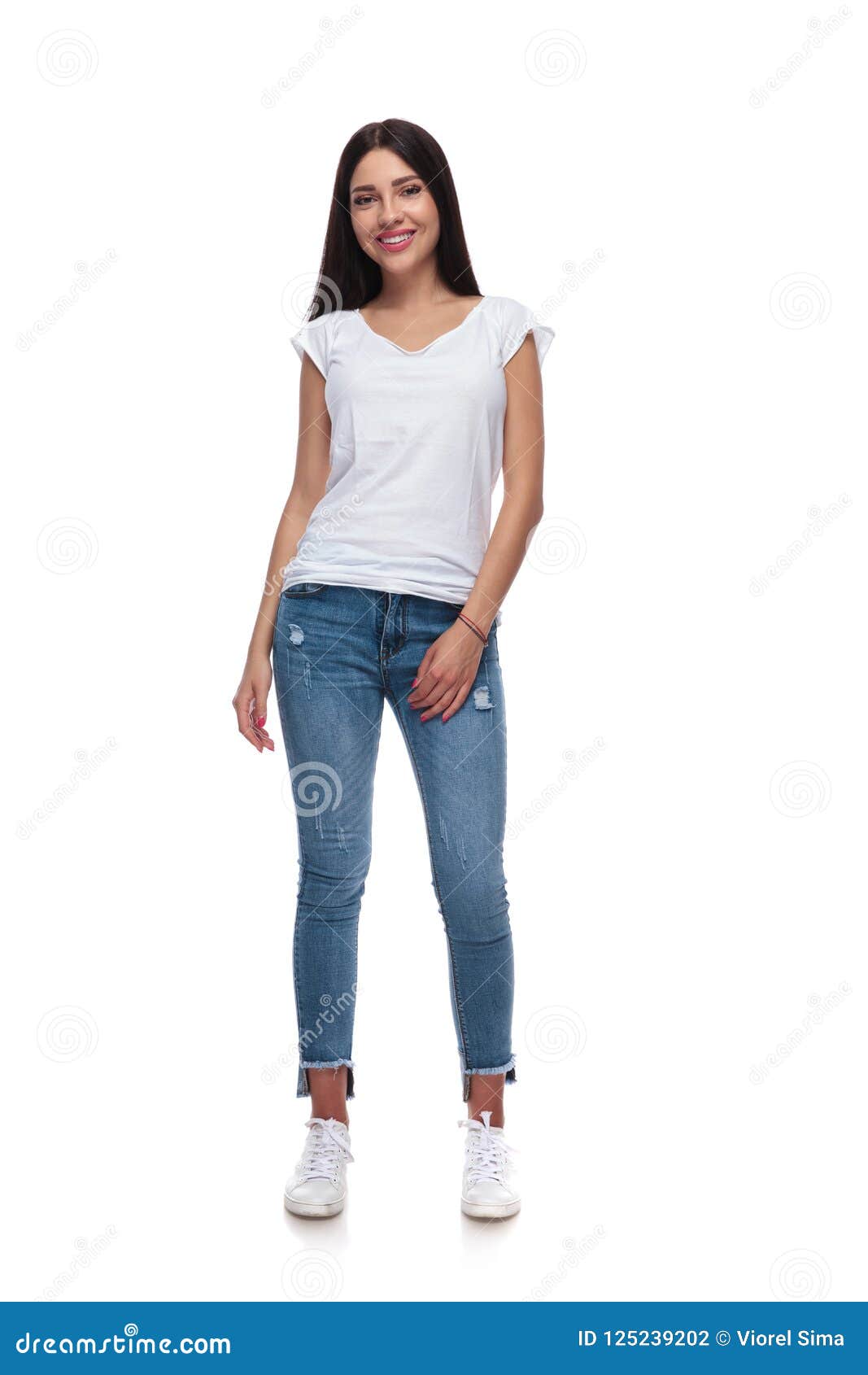 Brunette Casual Girl Wearing Jeans And T-shirt Standing Stock Photo - Image  of body, hair: 125239202