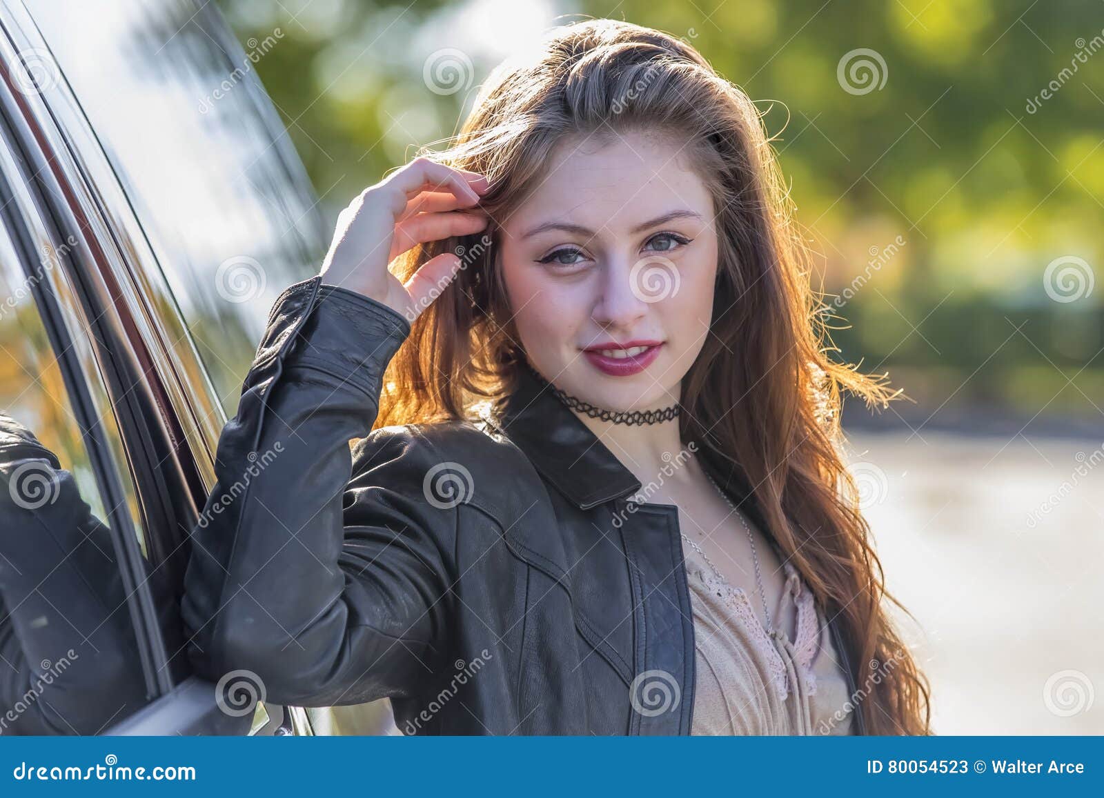 Brunette Coed Enjoying The Fall Foliage Stock Image