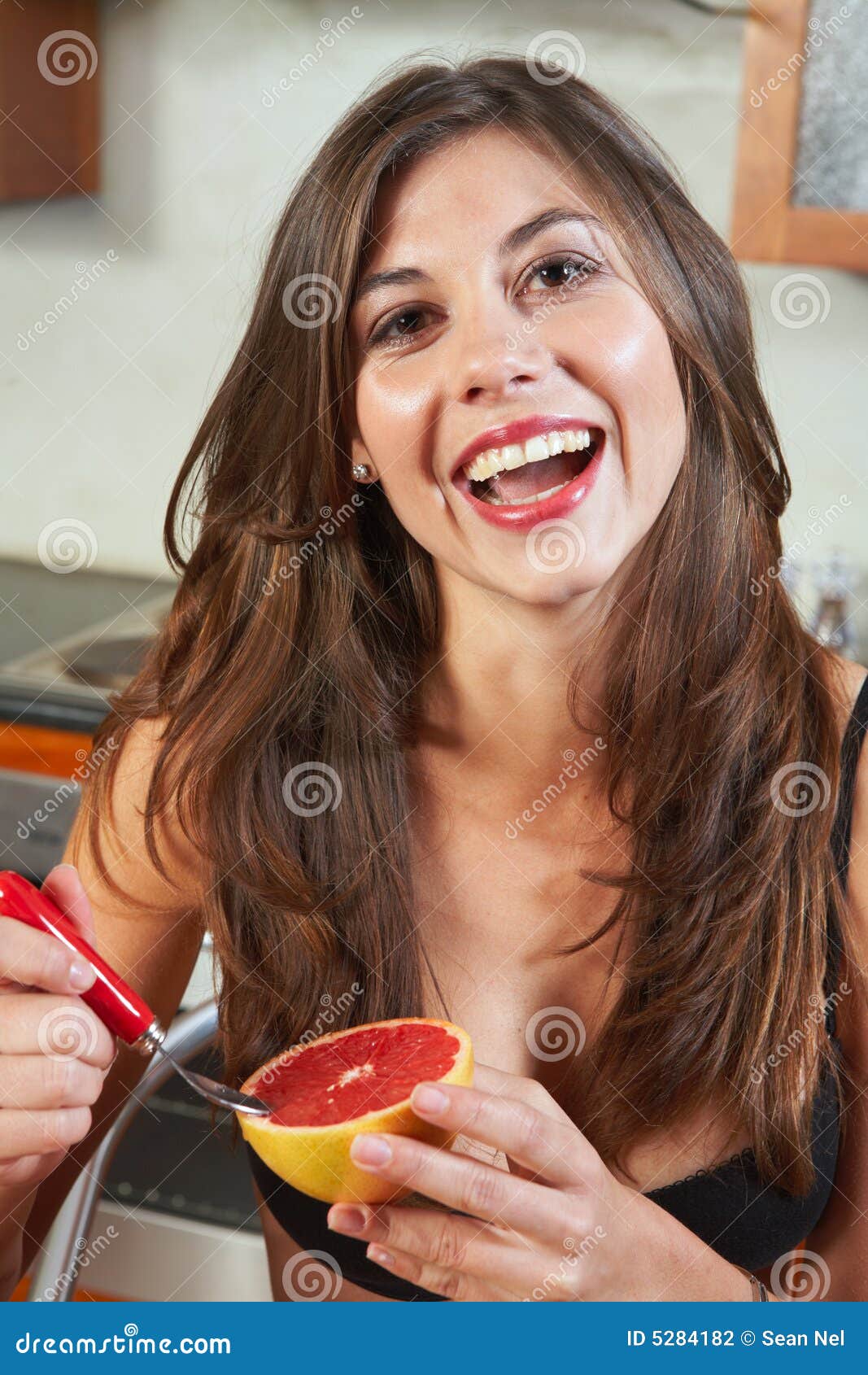 Brunette eating breakfast stock photo. Image of room, female - 5284182