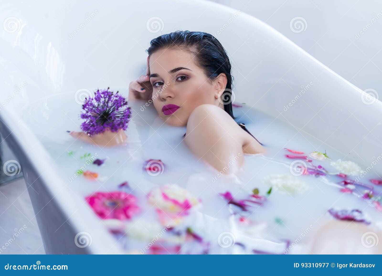 Brunette Woman Relaxing In A Hot Bath With Flowers Stock Image Image