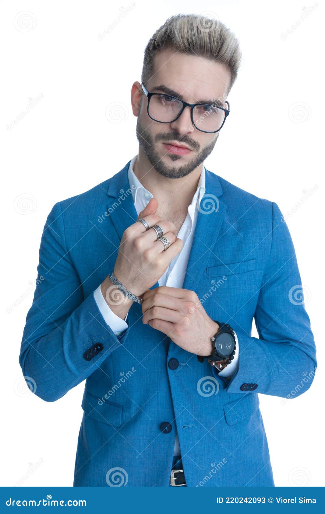 Male fist with bracelet on formal suit background. Bracelet or amulet on  wrist. Amulet concept. Hand of business person with amulet made out of  black beads. Symbol of luck or fashionable accessory