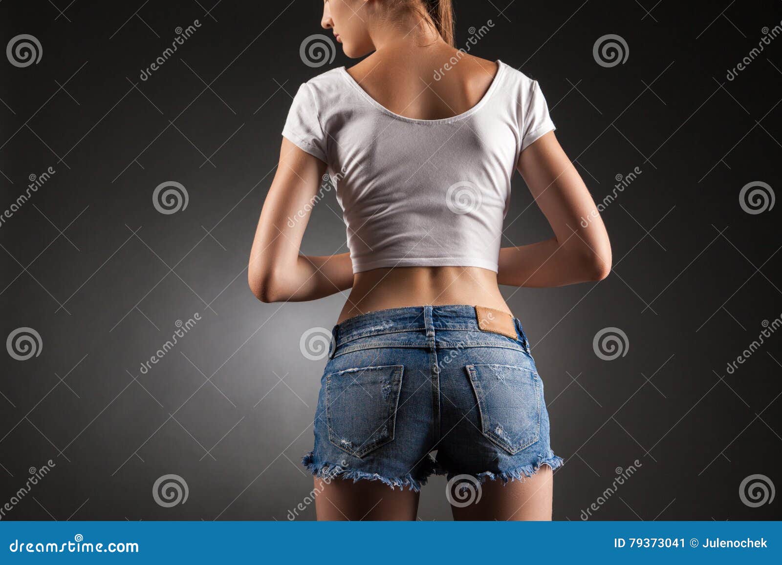 In denim shorts. stock image. Image of denim, legs, sensuality 79373041