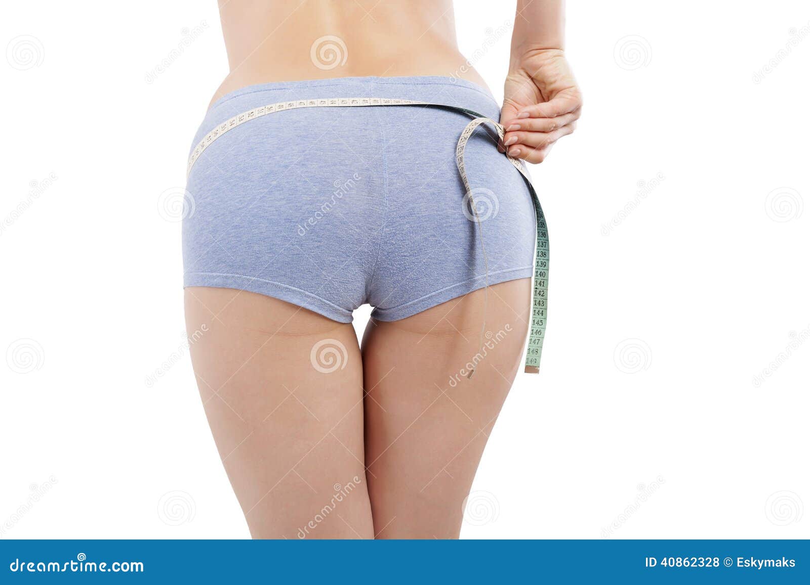 Rear View Of The Midriff And Buttocks Of A 38 Year Old Woman In Underwear  Posing In A Bathroom In A Concept Of Weight And Healthy Diet Stock Photo,  Picture and Royalty