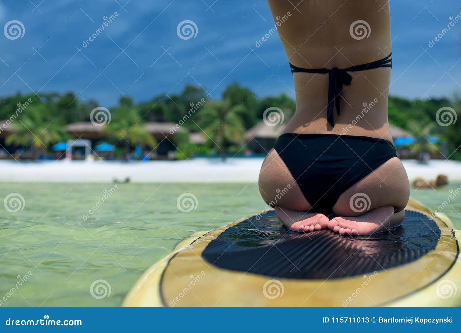 Girl Swimming at the Paddle Board picture