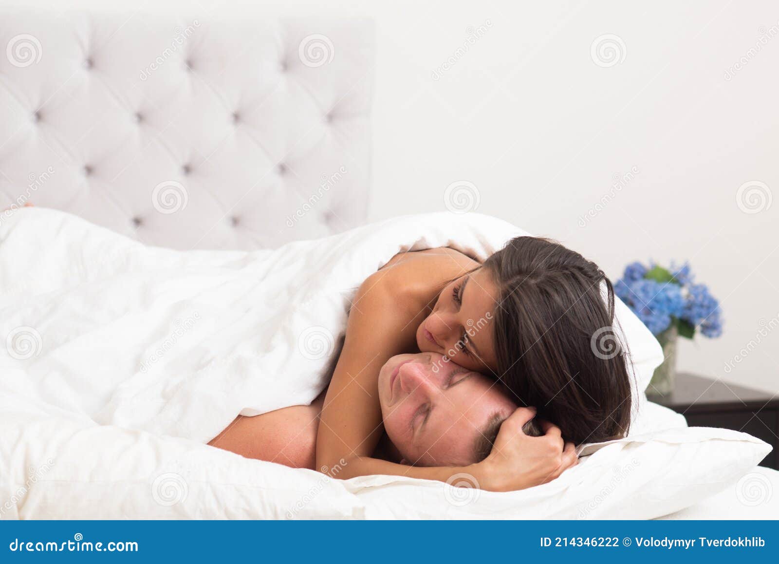 Couple in Bed. Man Having Sex with Girl without Sexual Dress. Reality image